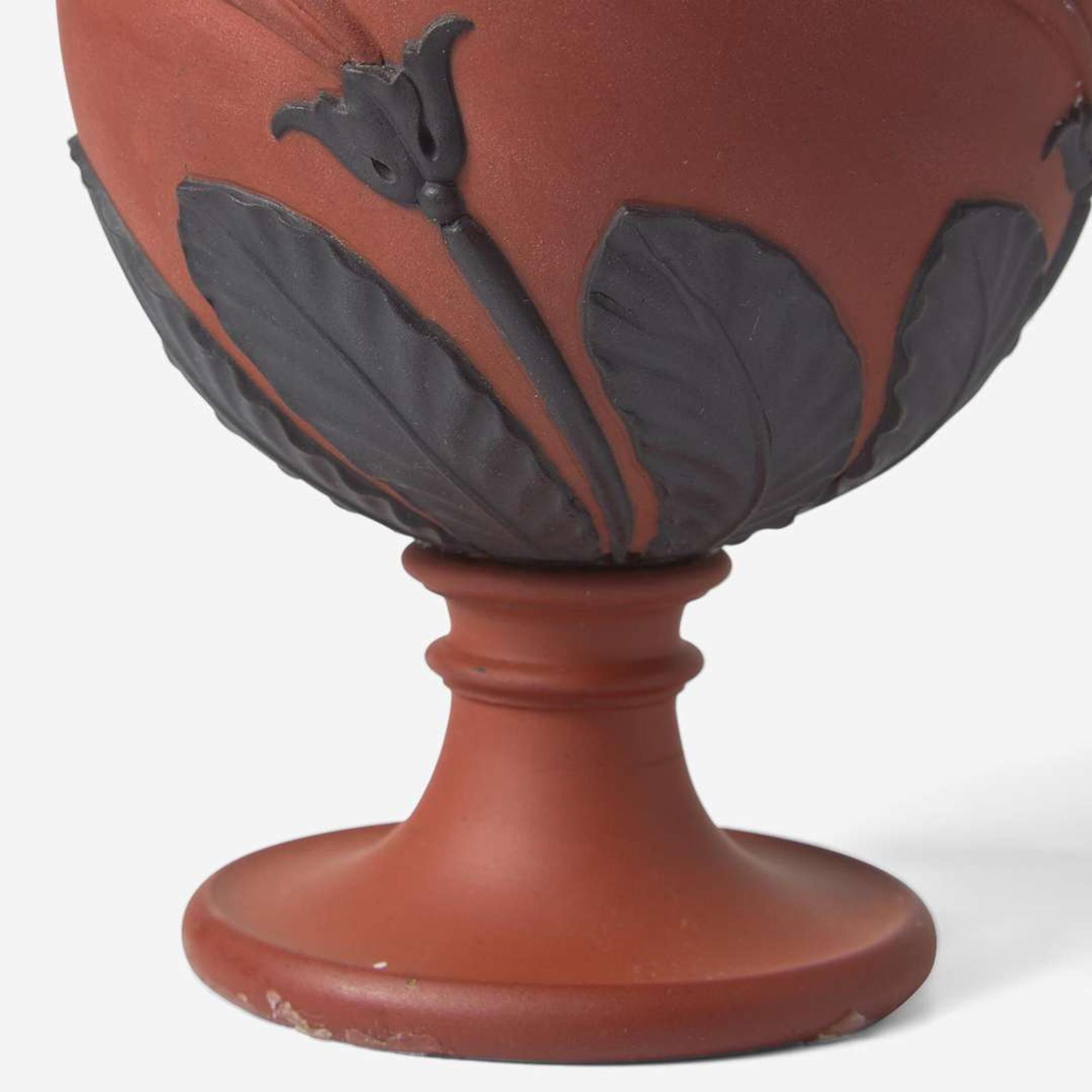 A Pair of Wedgwood Black Basaltes-Decorated Rosso Antico "Tendril" Vases UK, circa 1800