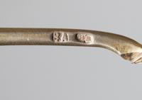 A Russian Silver-Gilt and Enamel Spoon, Mark of Vasiili Agafonov, Moscow, late 19th/early 20th century, having an enameled finial on a