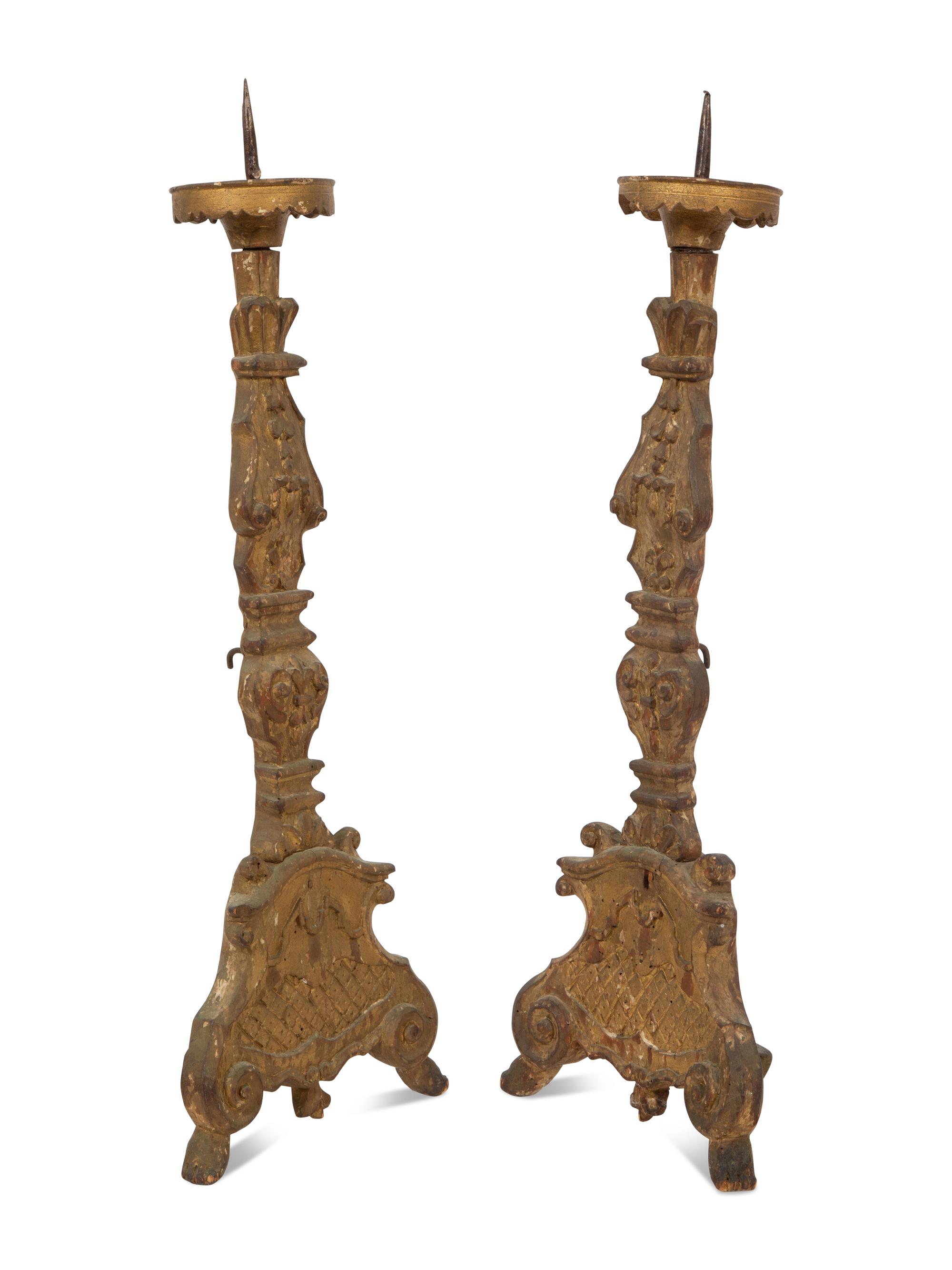 A Pair of Italian Baroque Style Carved Giltwood Pricket Sticks