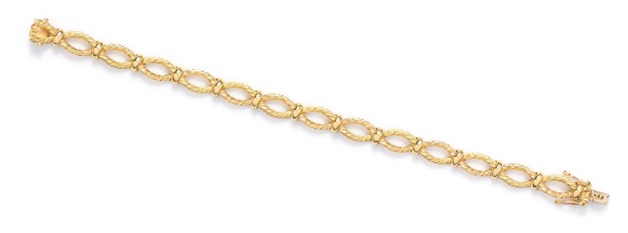 An 18 Karat Yellow Gold Textured Link Bracelet, Tiffany & Co., French, Circa 1991, 12.20 dwts.