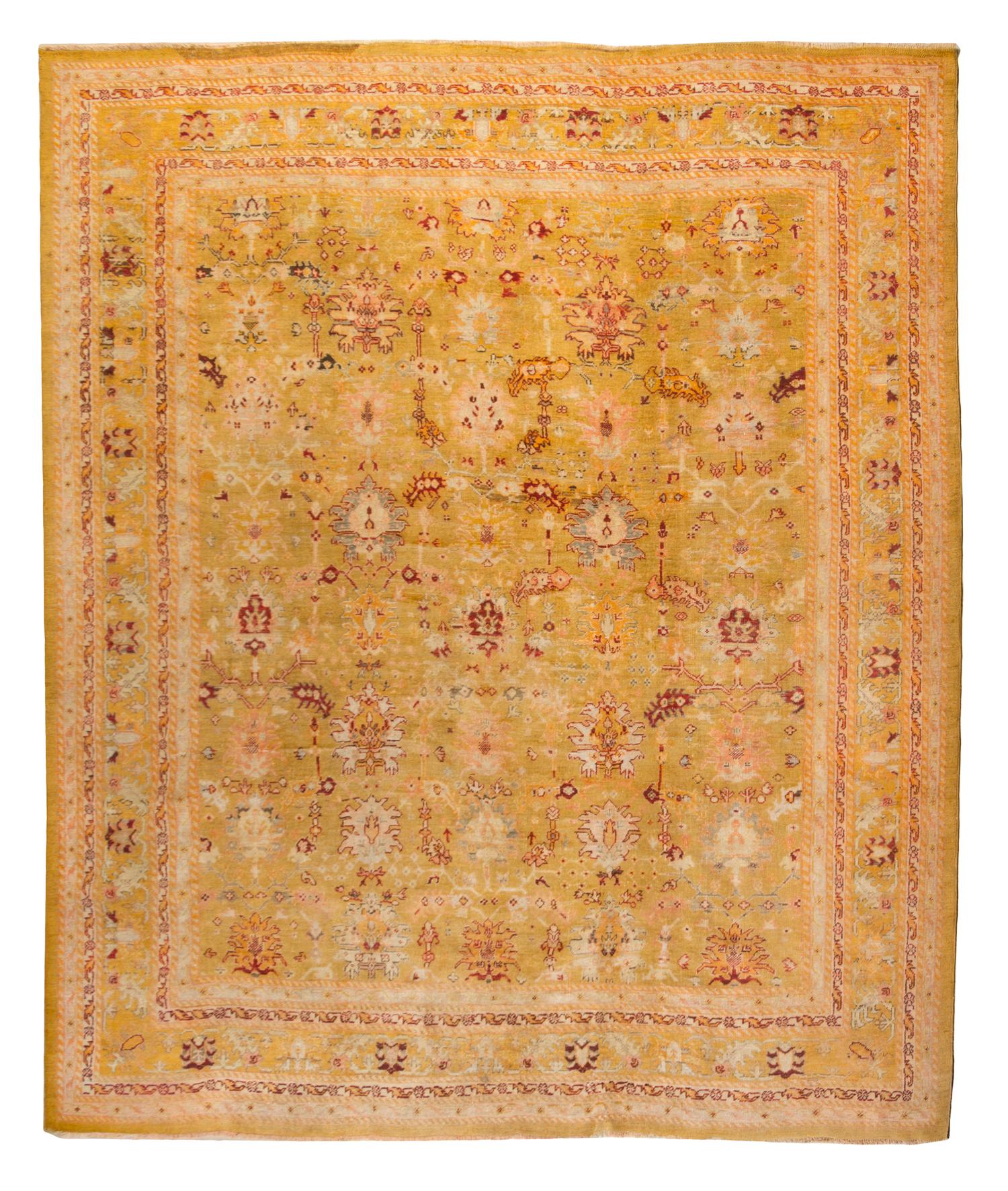 A Persian Wool Rug 12 feet x 10 feet 6 inches.