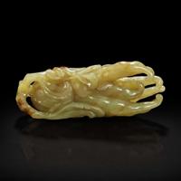 A Chinese celadon jade "Buddha's hand" citron pendant 青玉佛手