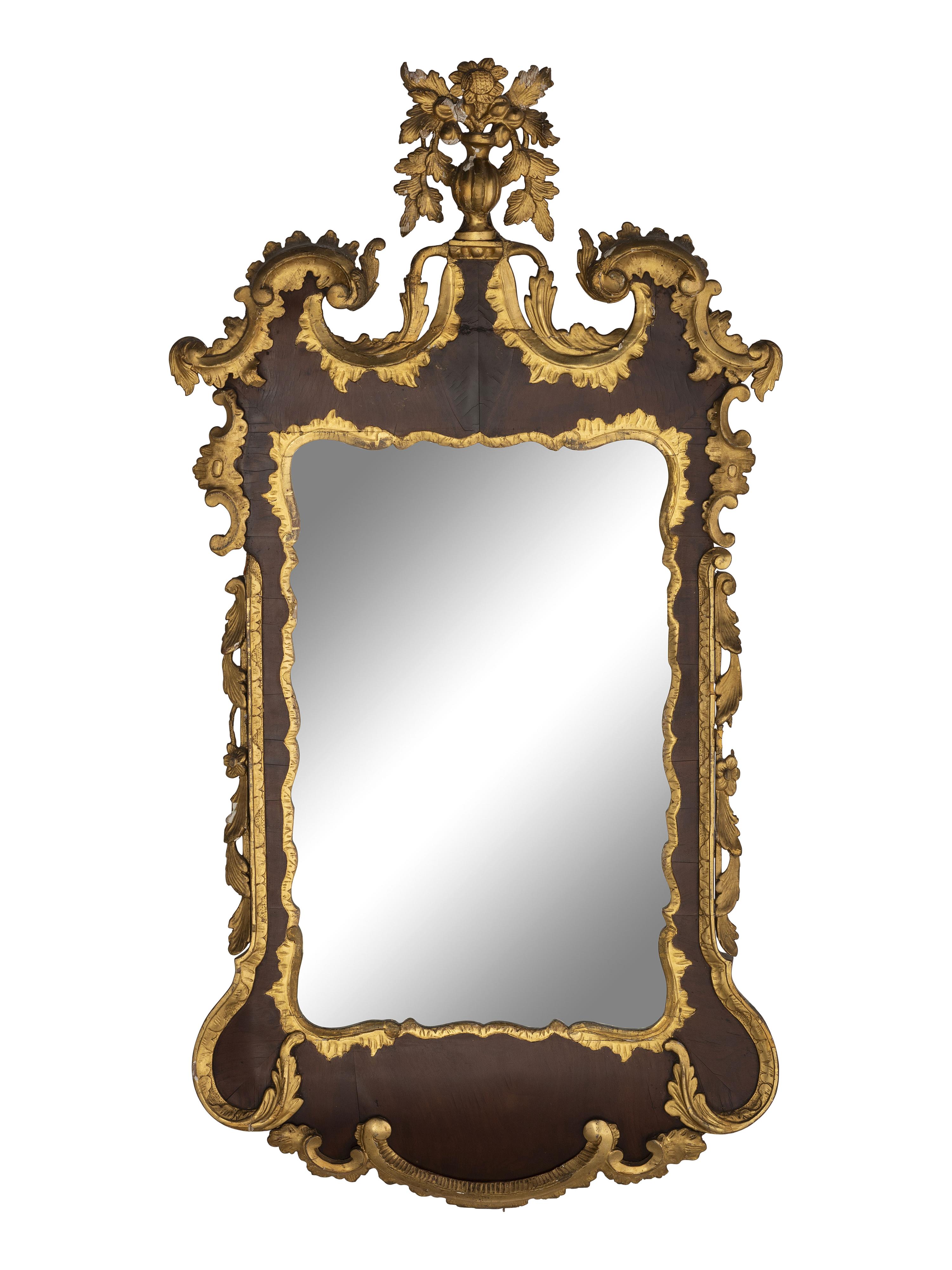 A George II Carved and Parcel-Gilt Mahogany Mirror
