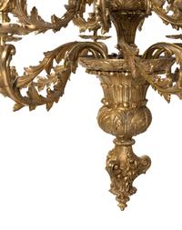A Louis XV Style Gilt Bronze Sixteen-Light Chandelier