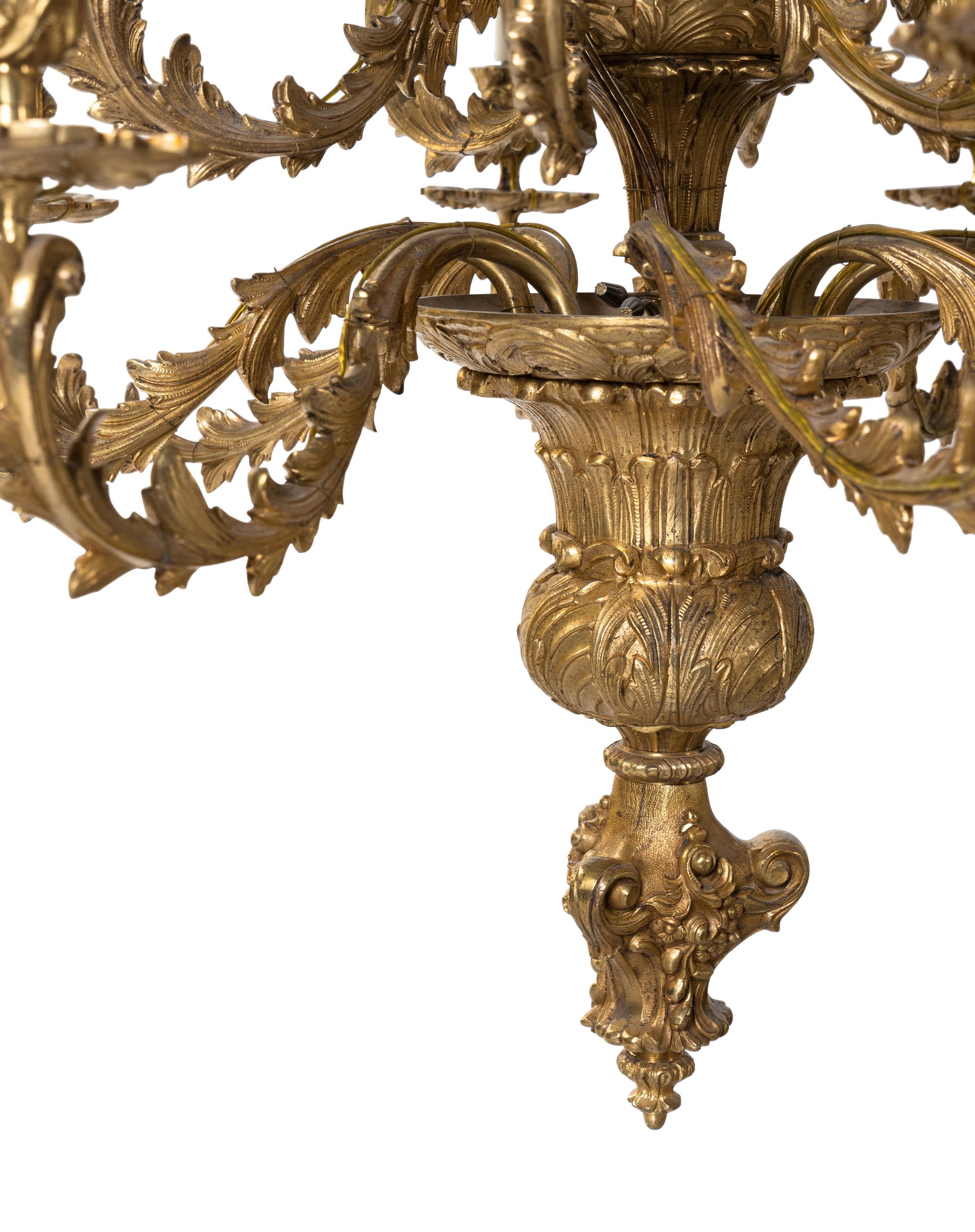 A Louis XV Style Gilt Bronze Sixteen-Light Chandelier