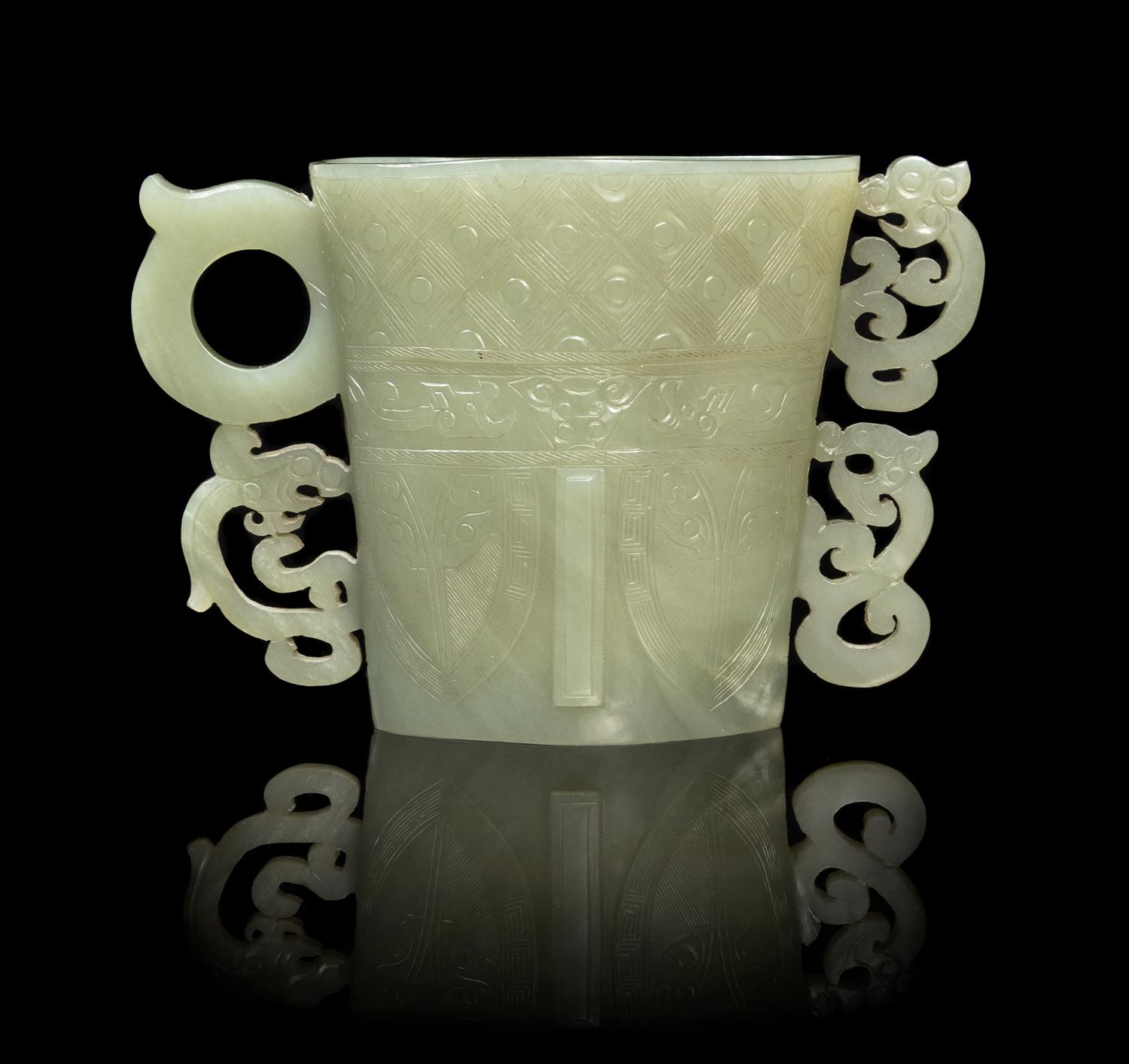 A Chinese Celadon Jade Libation Cup 17TH/18TH CENTURY Height 3 7/8 inches. — 17TH/18TH CENTURY