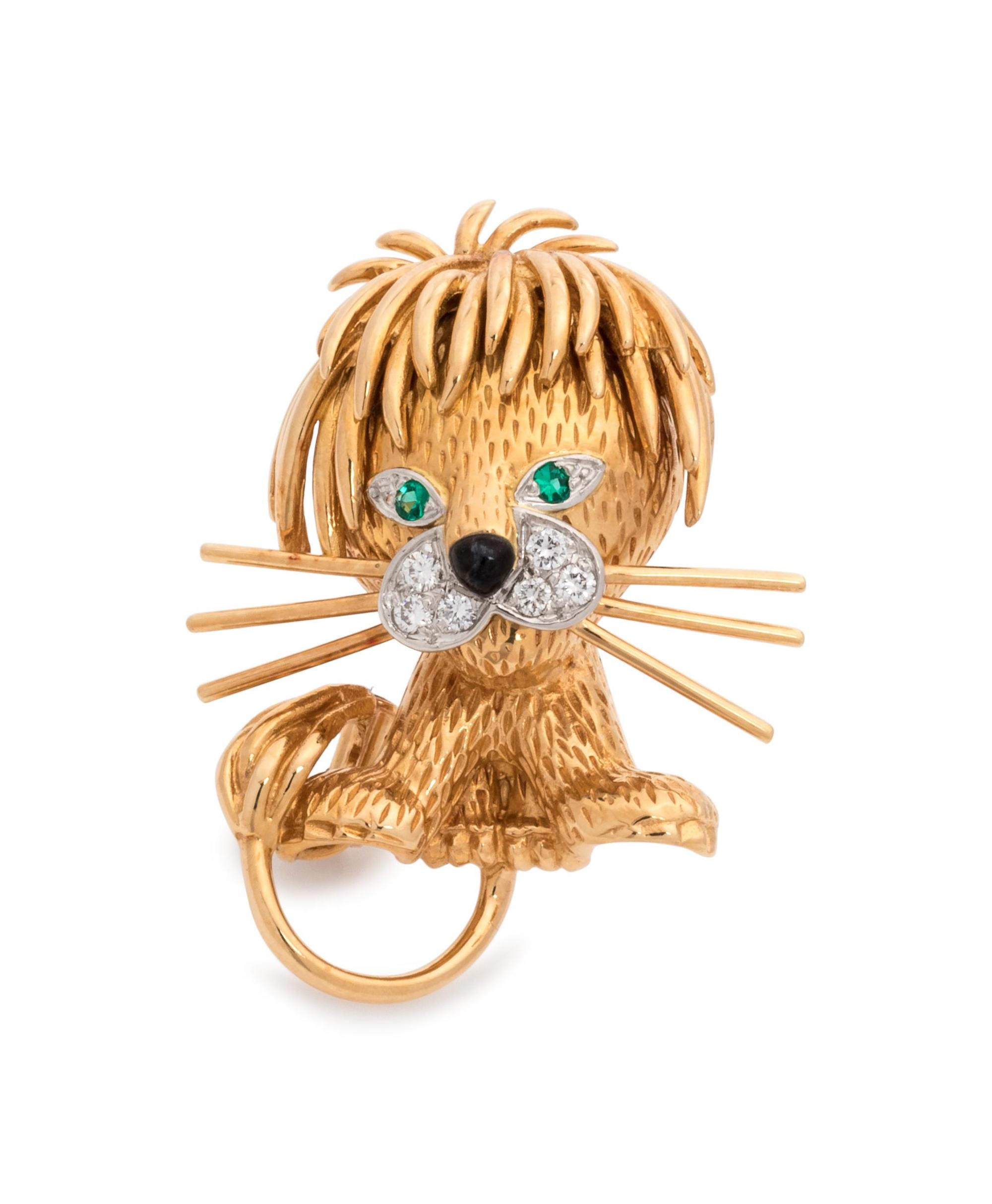 VAN CLEEF & ARPELS, YELLOW GOLD, DIAMOND AND EMERALD LION BROOCH
