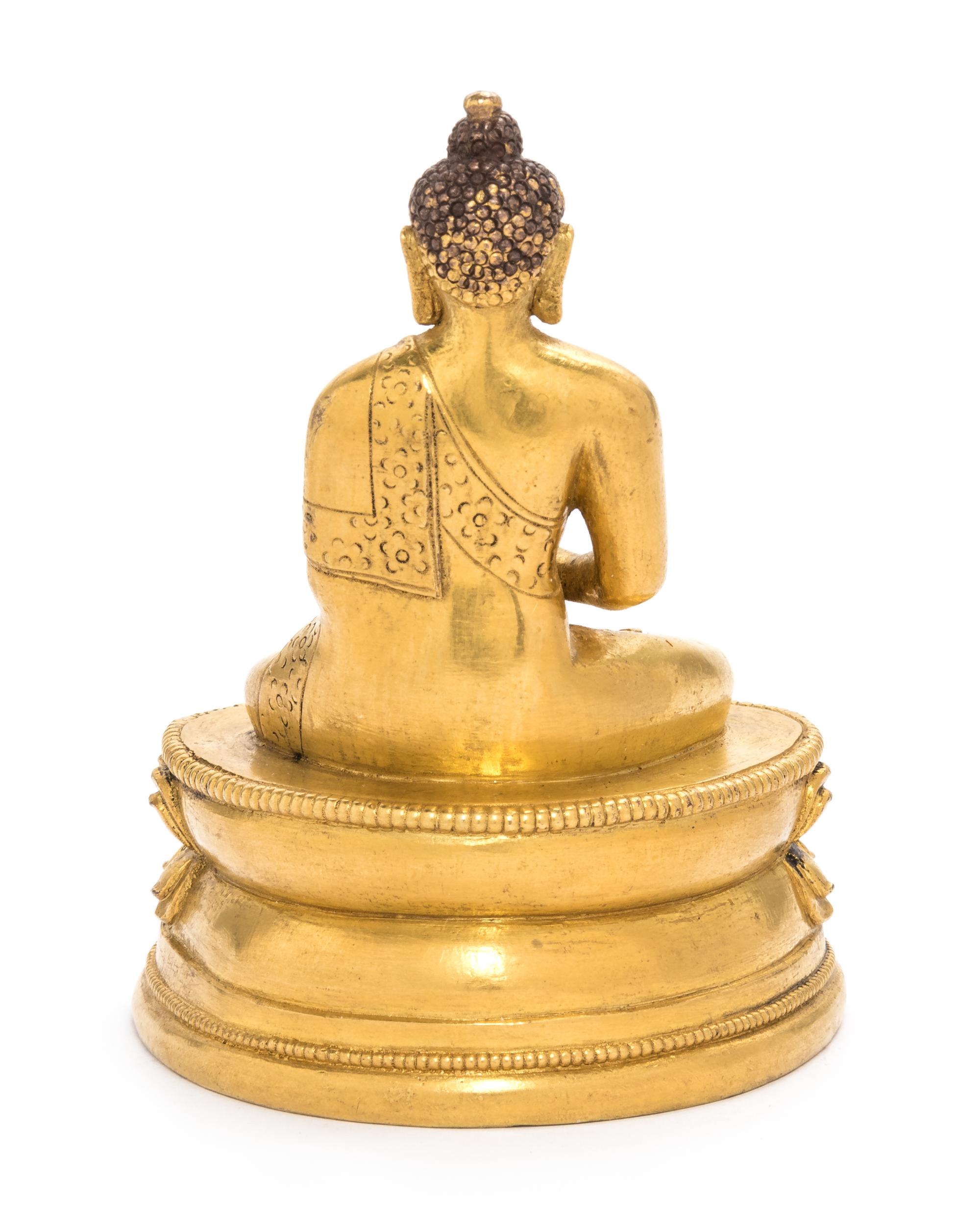 A Small Sino-Tibetan Gilt Bronze Figure of Shakyamuni Buddha Height 3 1/2 inches. — 18TH/19TH CENTURY