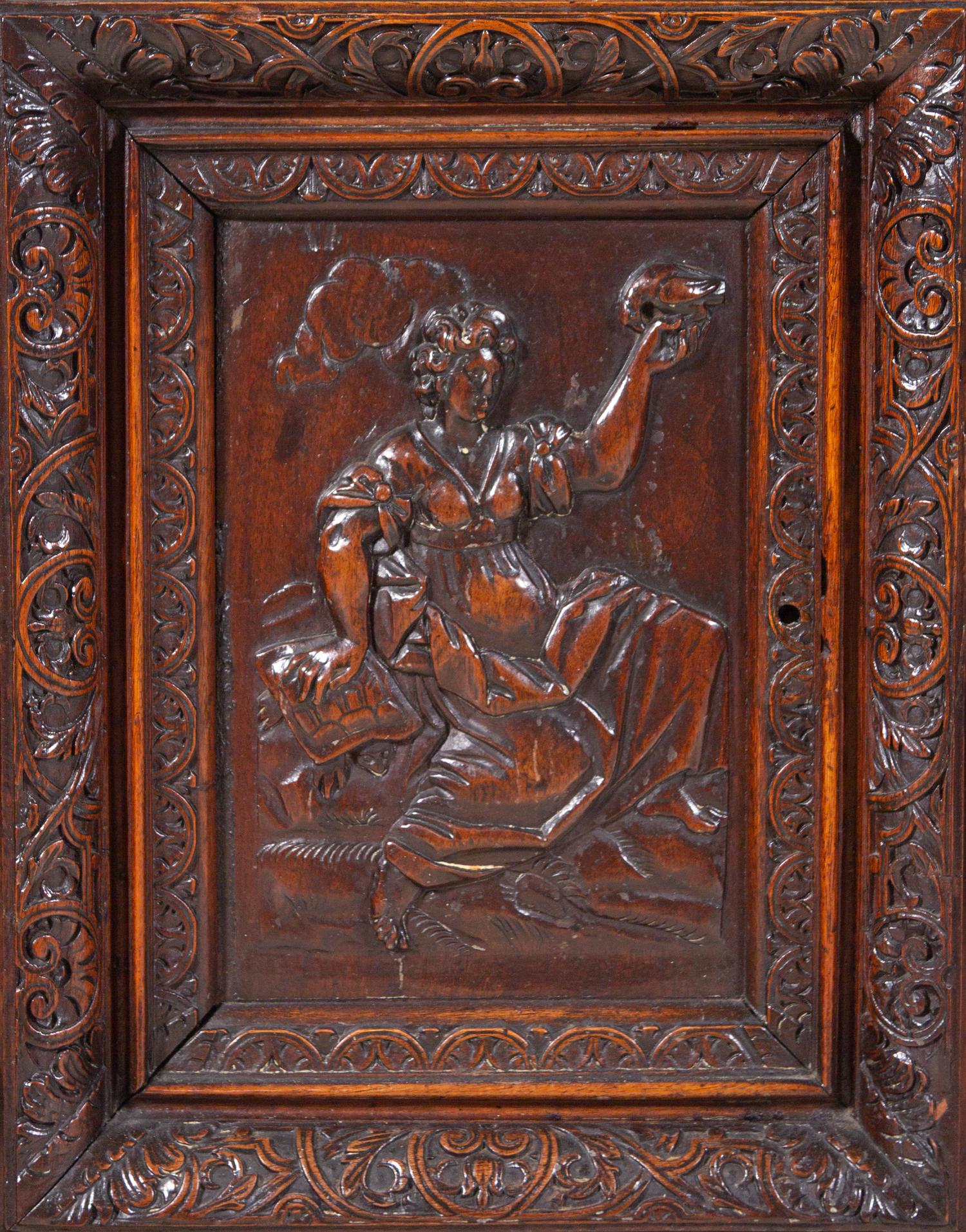 A Renaissance Revival Carved Walnut Marble-Top Cabinet