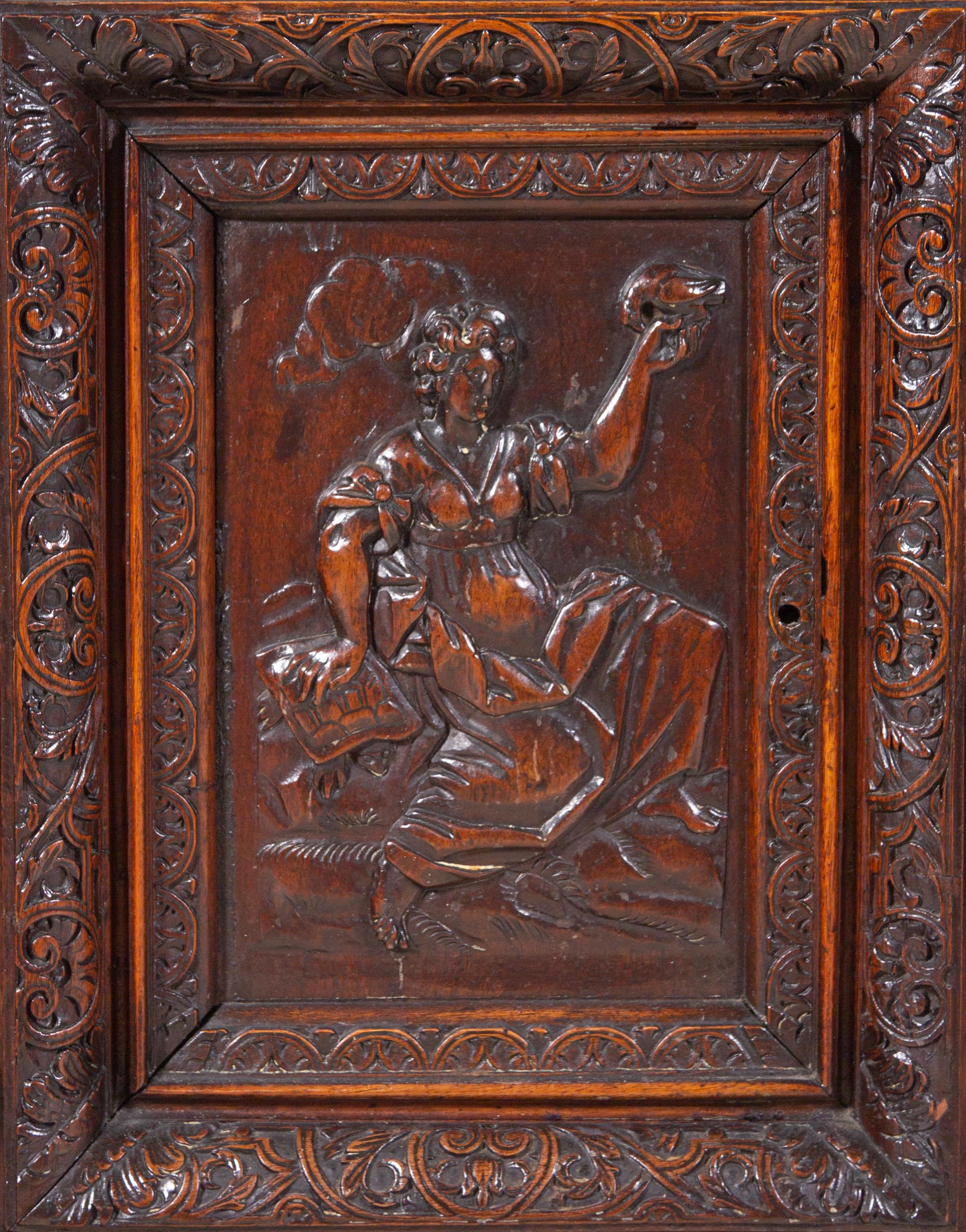 A Renaissance Revival Carved Walnut Marble-Top Cabinet