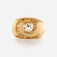 A diamond, colored diamond, and eighteen karat gold ring