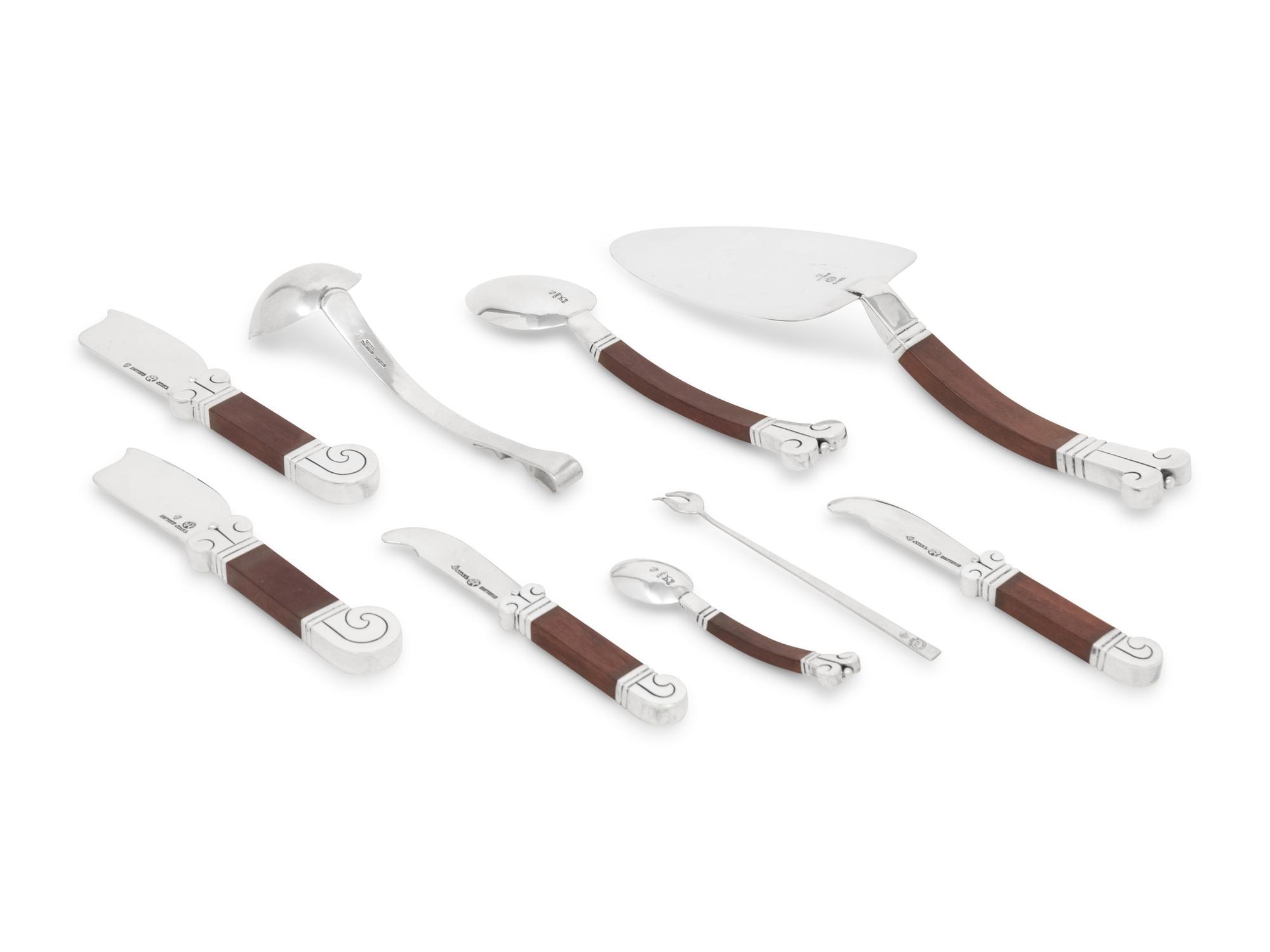 A Collection of Mexican Rosewood Mounted Silver Serving Articles