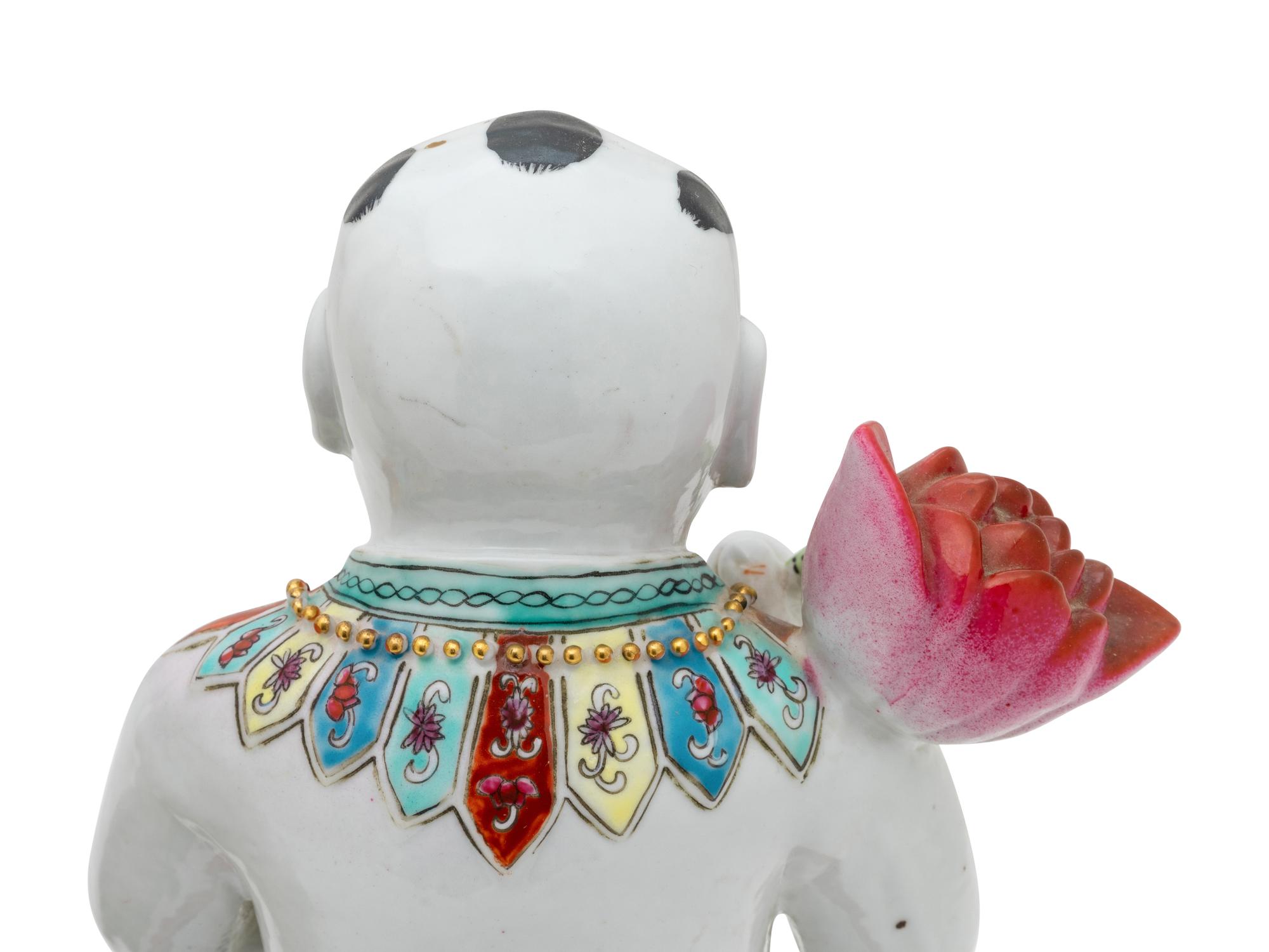 Two Chinese Famille Rose Porcelain Figures of Boys