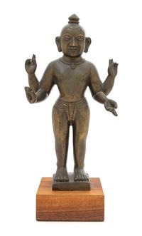 An Indian Bronze Figure of a Deity Height 13 3/4 inches. — BENGAL, 18TH/19TH CENTURY