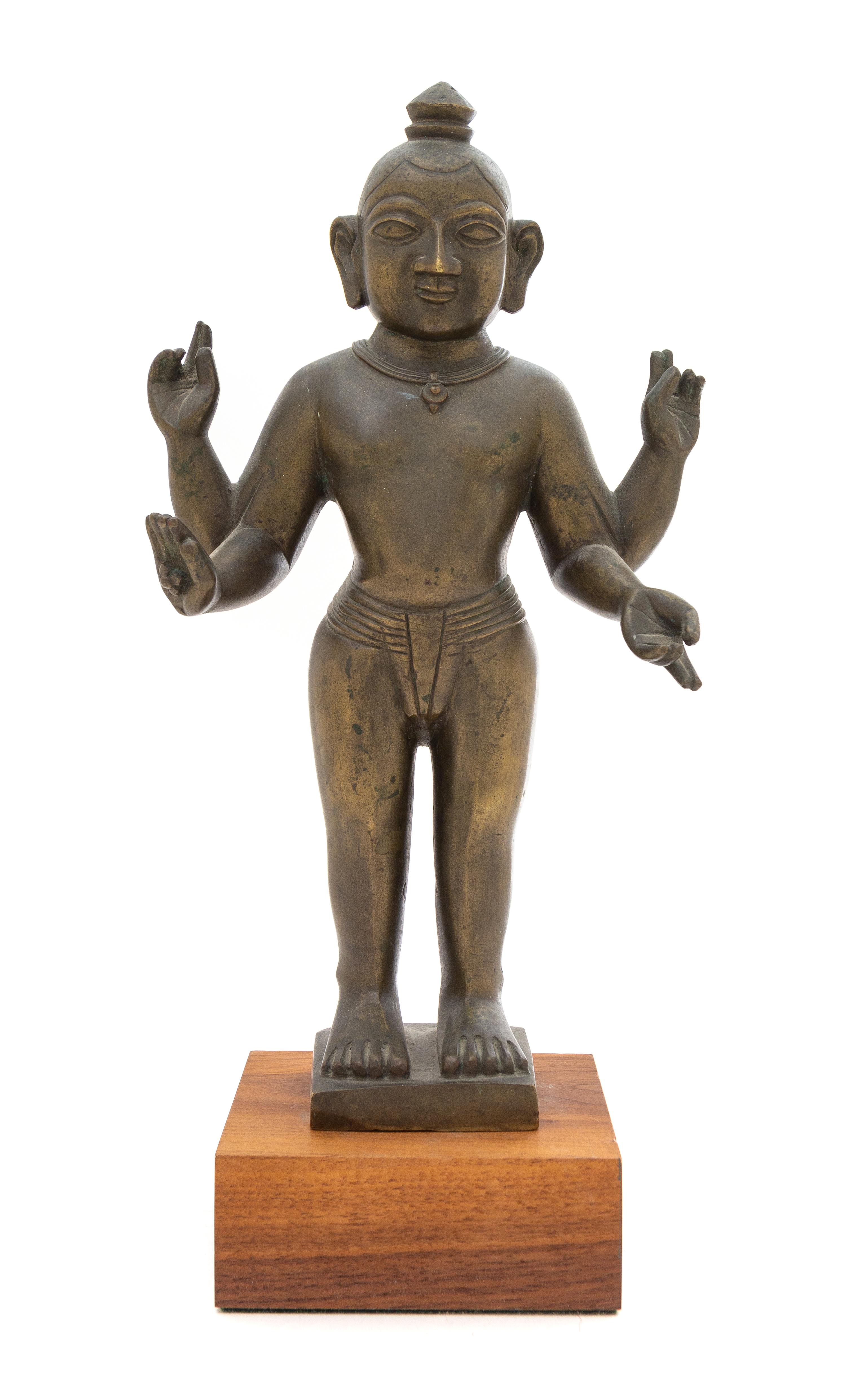 An Indian Bronze Figure of a Deity Height 13 3/4 inches. — BENGAL, 18TH/19TH CENTURY