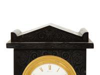 A Regency Black Slate and Gilt Bronze Mantel Clock