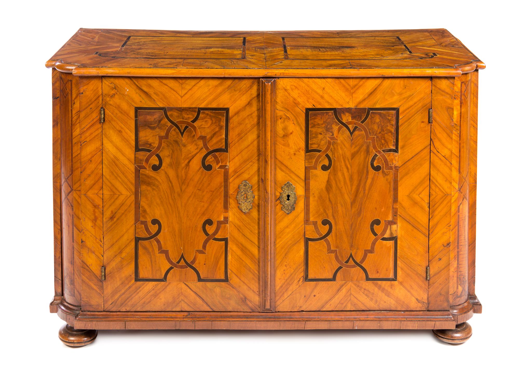 A German Banded Walnut Cabinet Height 32 1/2 x width 48 1/2 x depth 23 3/4 inches. — 19TH CENTURY