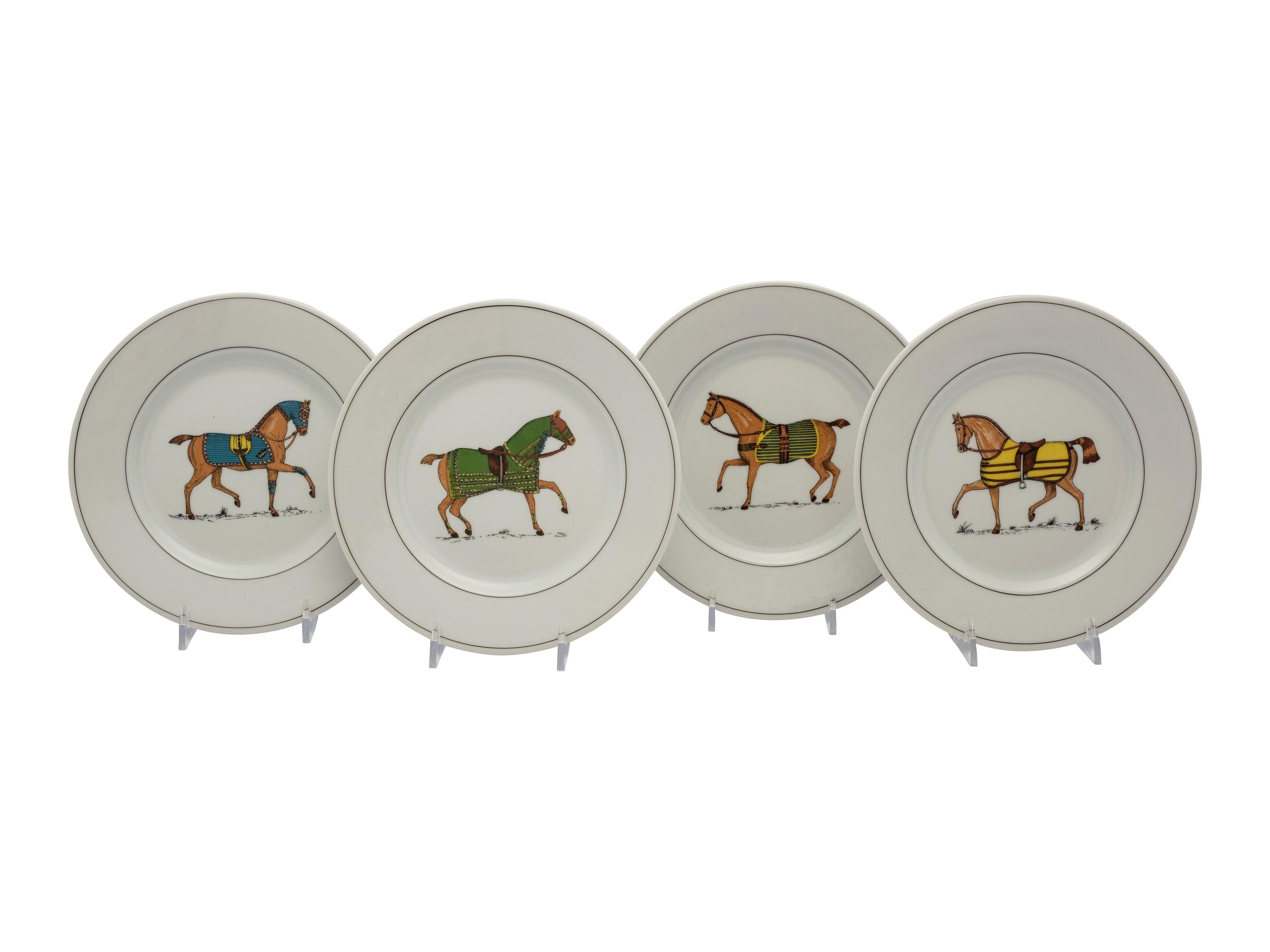 A Set of Twelve French Porcelain Bistro Plates in the Equestrian Taste
