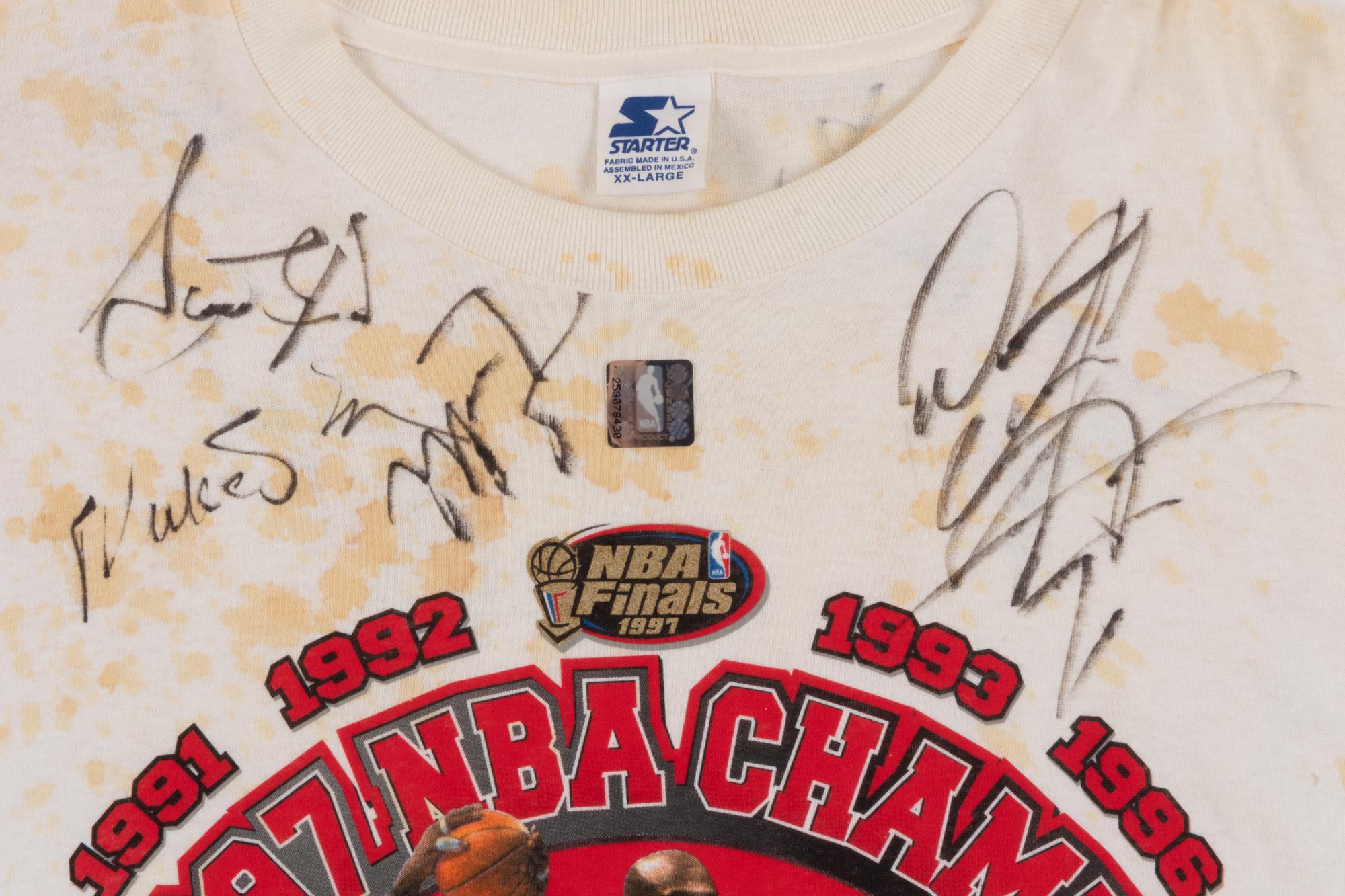 A Michael Jordan and Chicago Bulls Team Signed 1997 NBA Champions Locker Room Shirt (Beckett LOA),