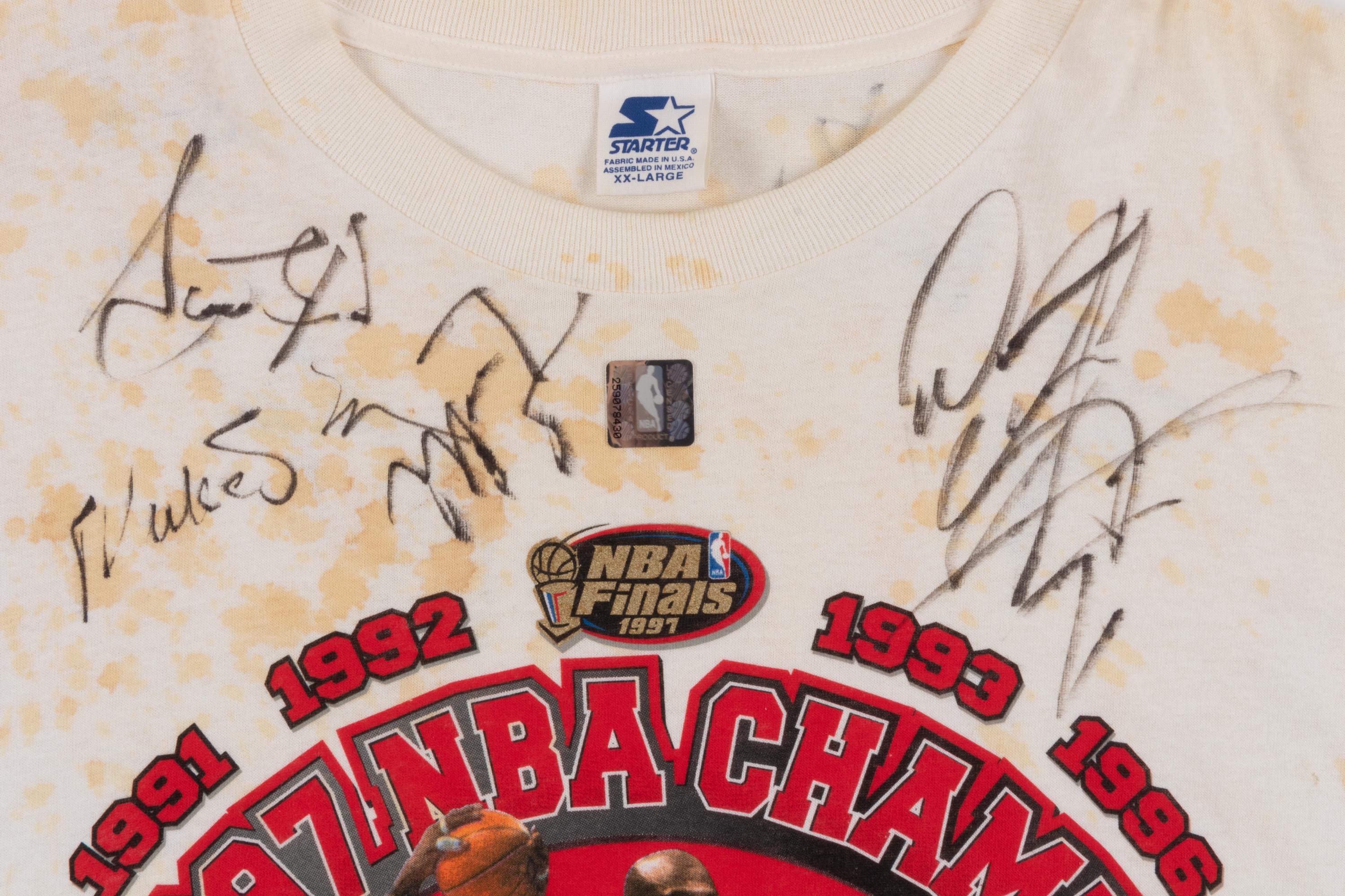 A Michael Jordan and Chicago Bulls Team Signed 1997 NBA Champions Locker Room Shirt (Beckett LOA),
