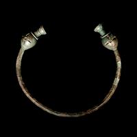 A Celtic Bronze Torc with Poppy-Head Terminals