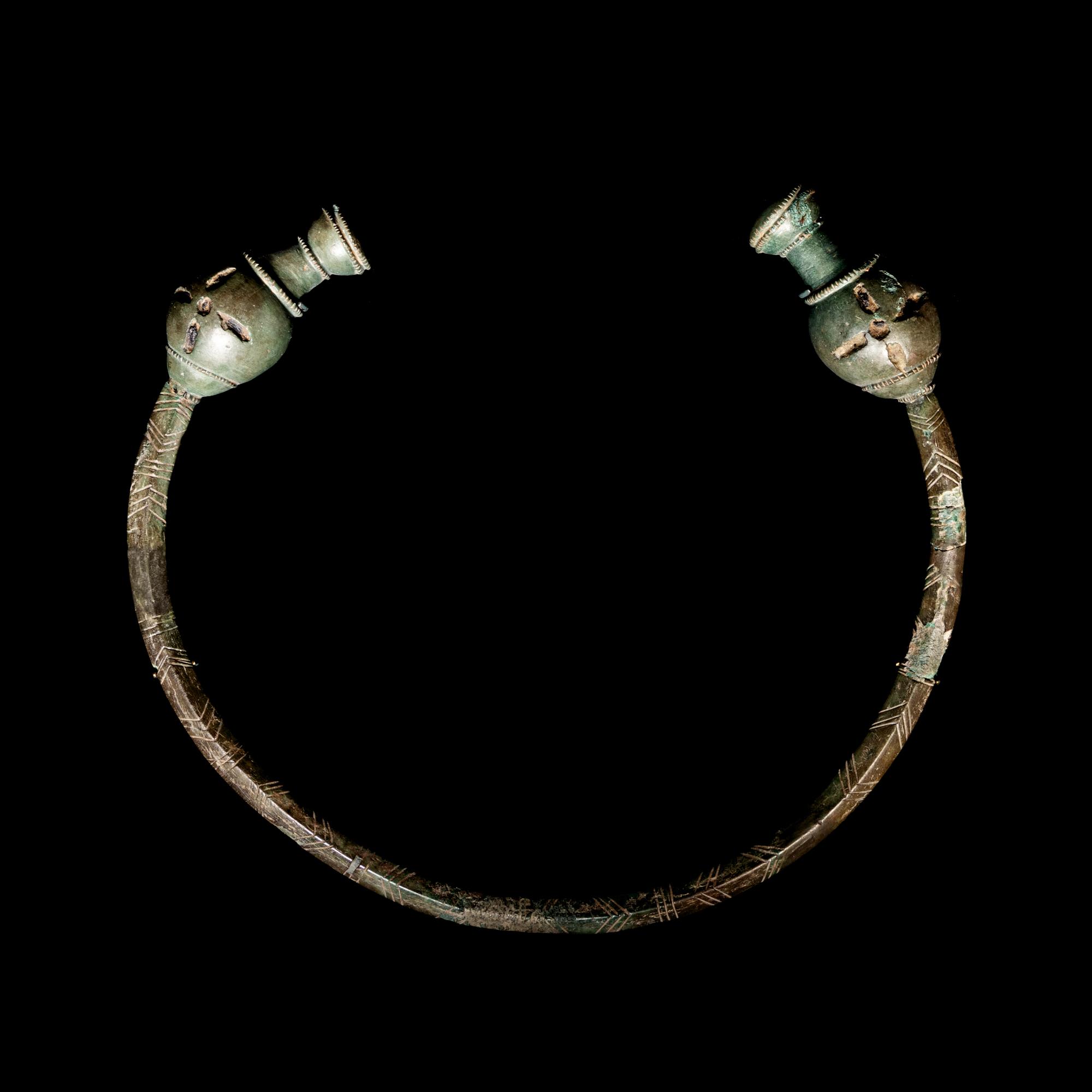 A Celtic Bronze Torc with Poppy-Head Terminals