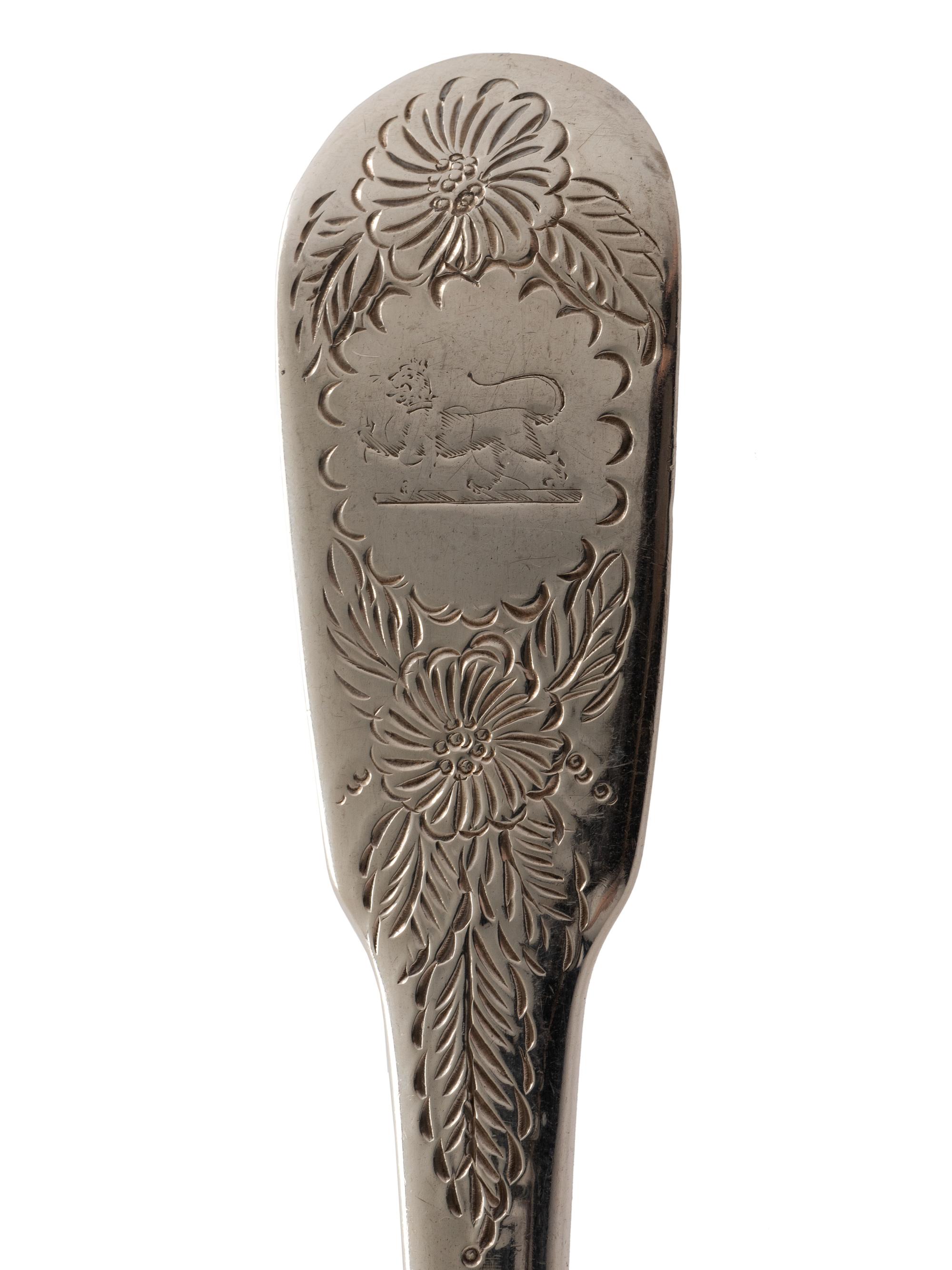 An English Silver Cranberry Spoon, Sauce Ladle and Slotted Ladle