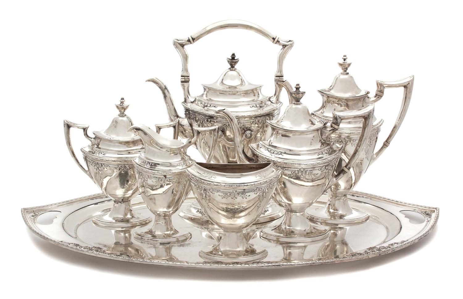 An American Silver Eight-Piece Tea and Coffee Service, Hardy & Hayes Co., Pittsburgh, PA, 20th Century, having a silverplate tray