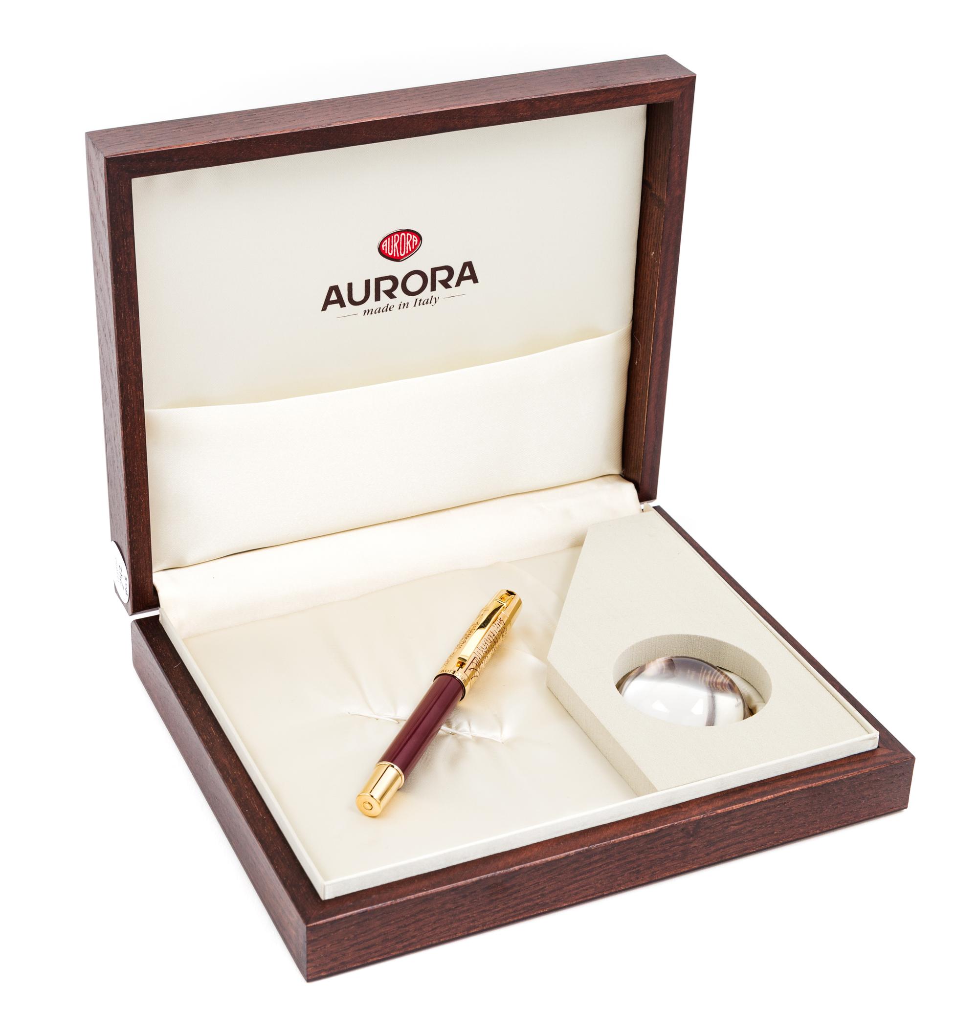 An Aurora Leonardo da Vinci Limited Edition Fountain Pen and Paperweight Set