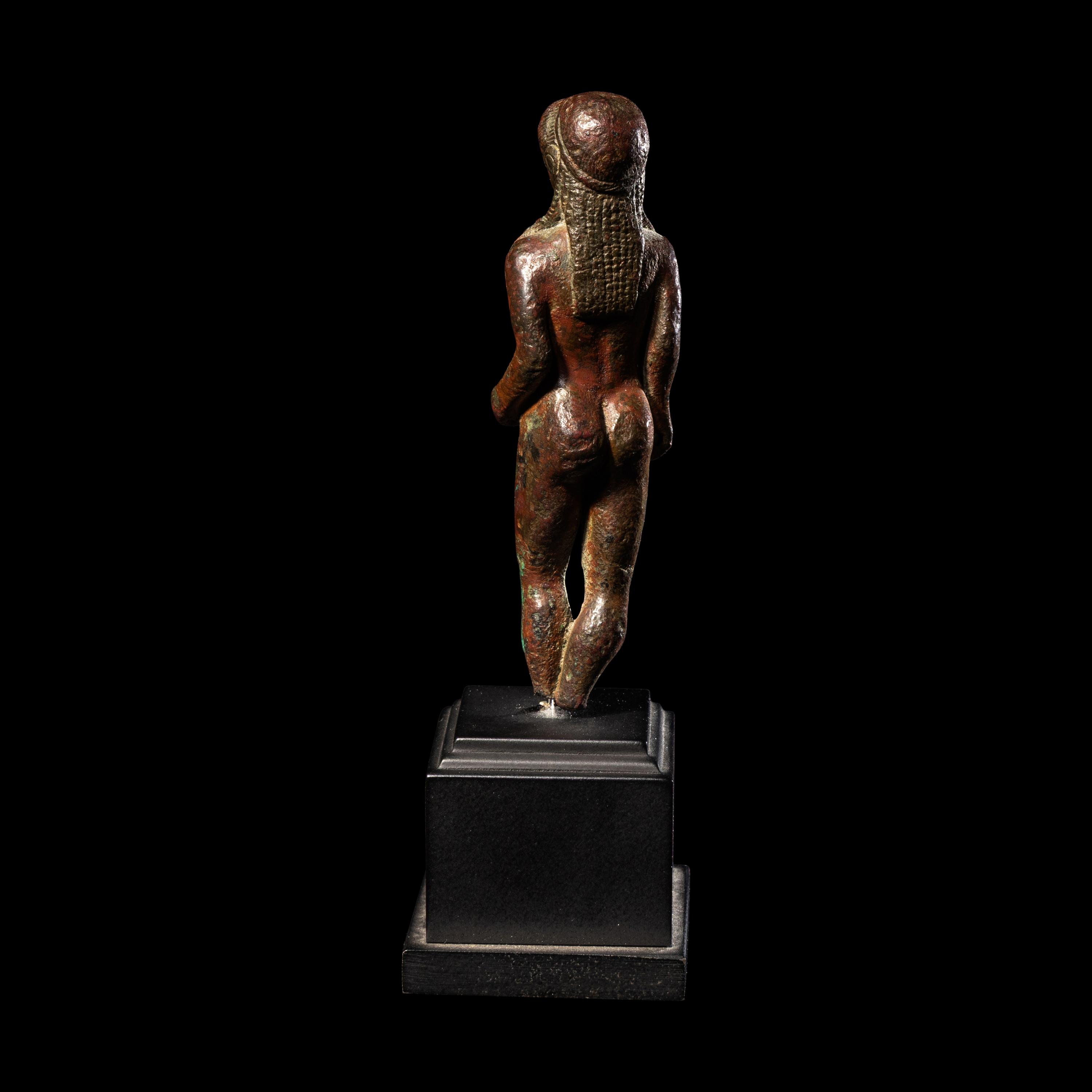A Greek Bronze Kouros