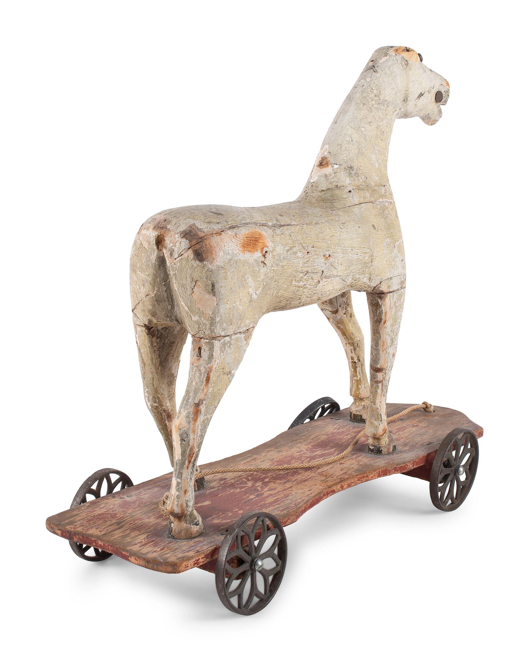 A Painted and Carved Wood Horse-Form Child's Pull Toy