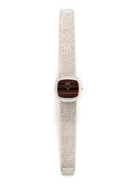 PIAGET, 18K WHITE GOLD AND TIGER'S EYE WATCH