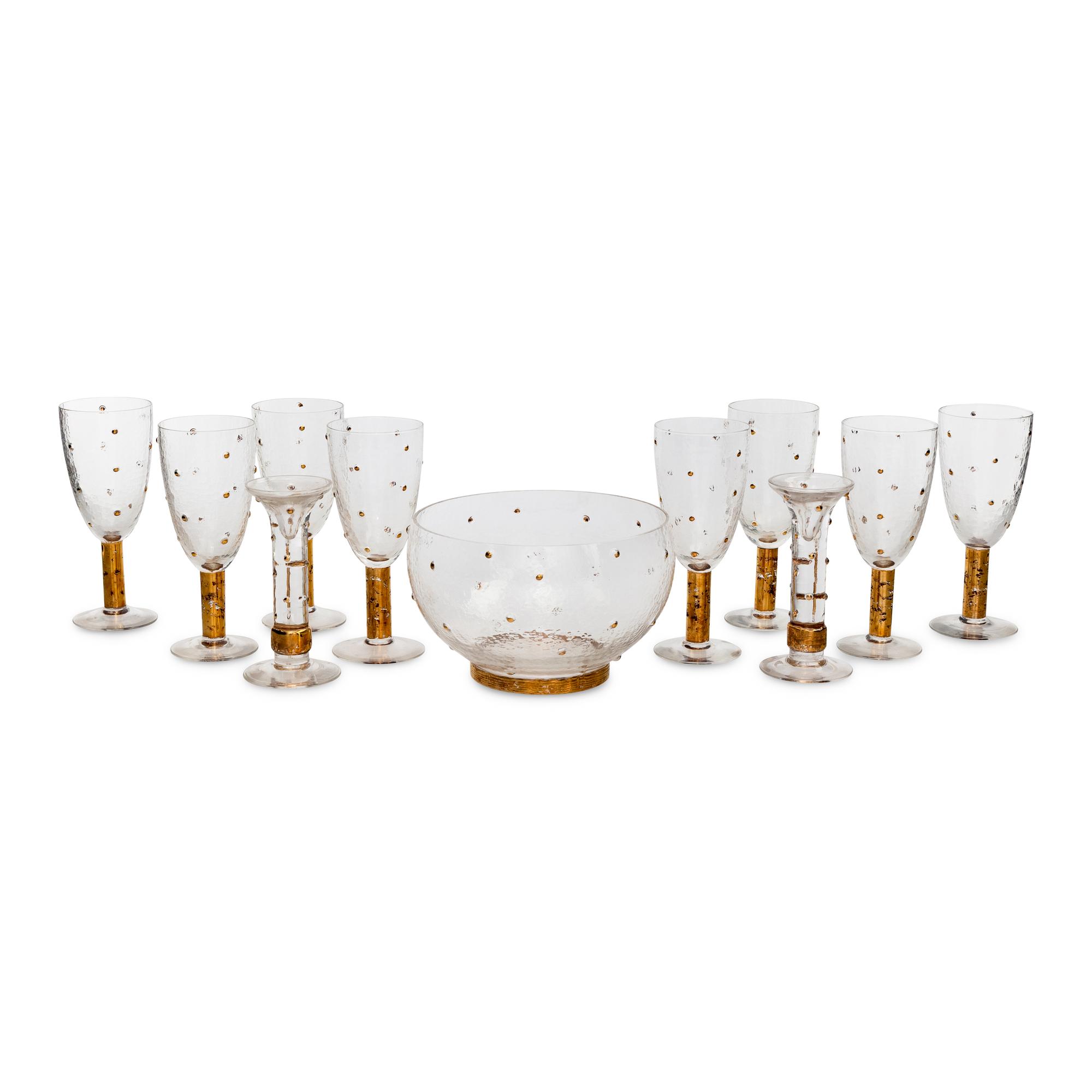 A Group of Eleven Stephen Smyers Parcel-Gilt Glass Table Articles