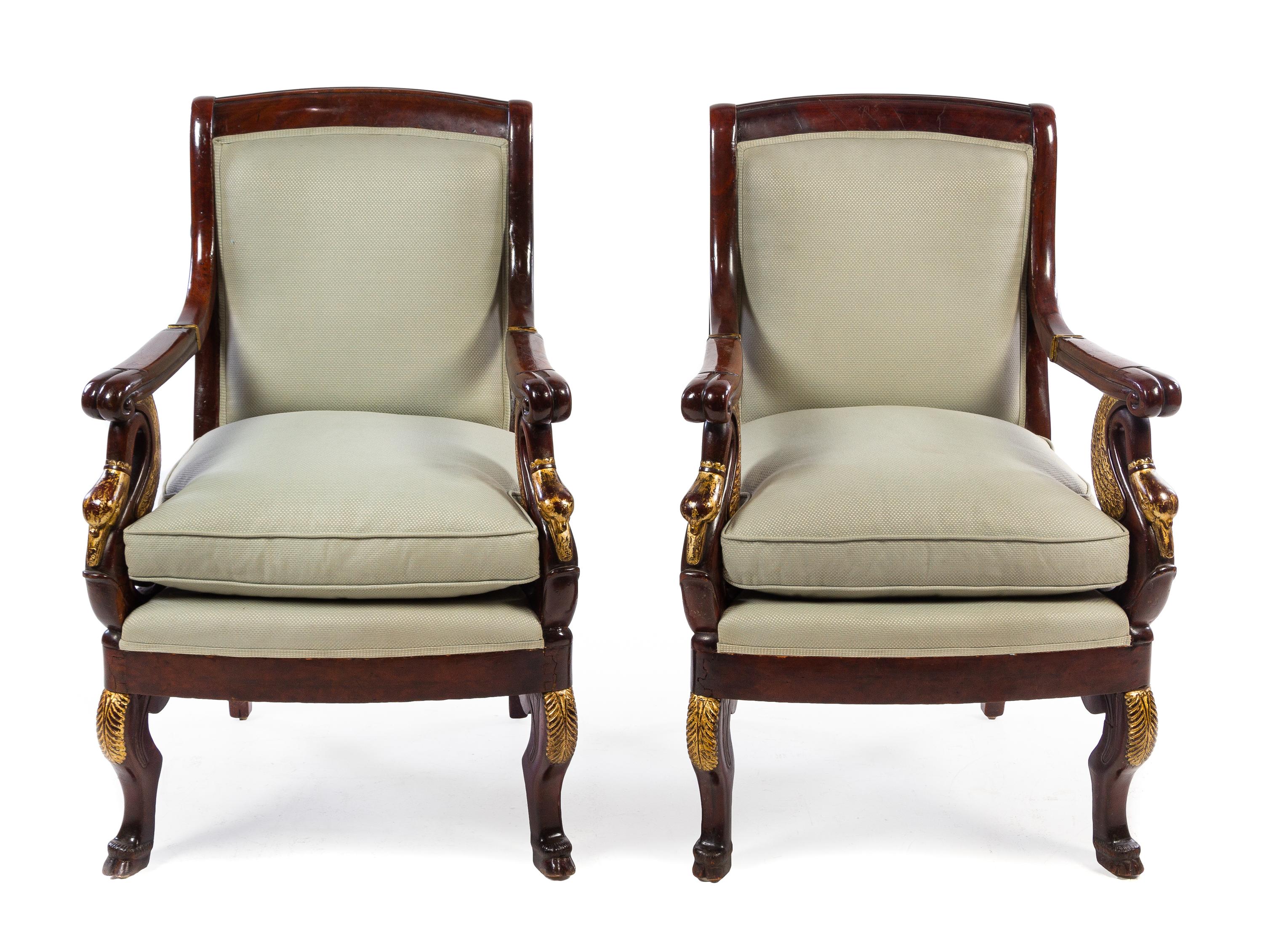 A Pair of Louis Philippe Style Parcel Gilt Mahogany Fauteuils Height 36 1/4 inches. — LATE 19TH/EARLY 20TH CENTURY