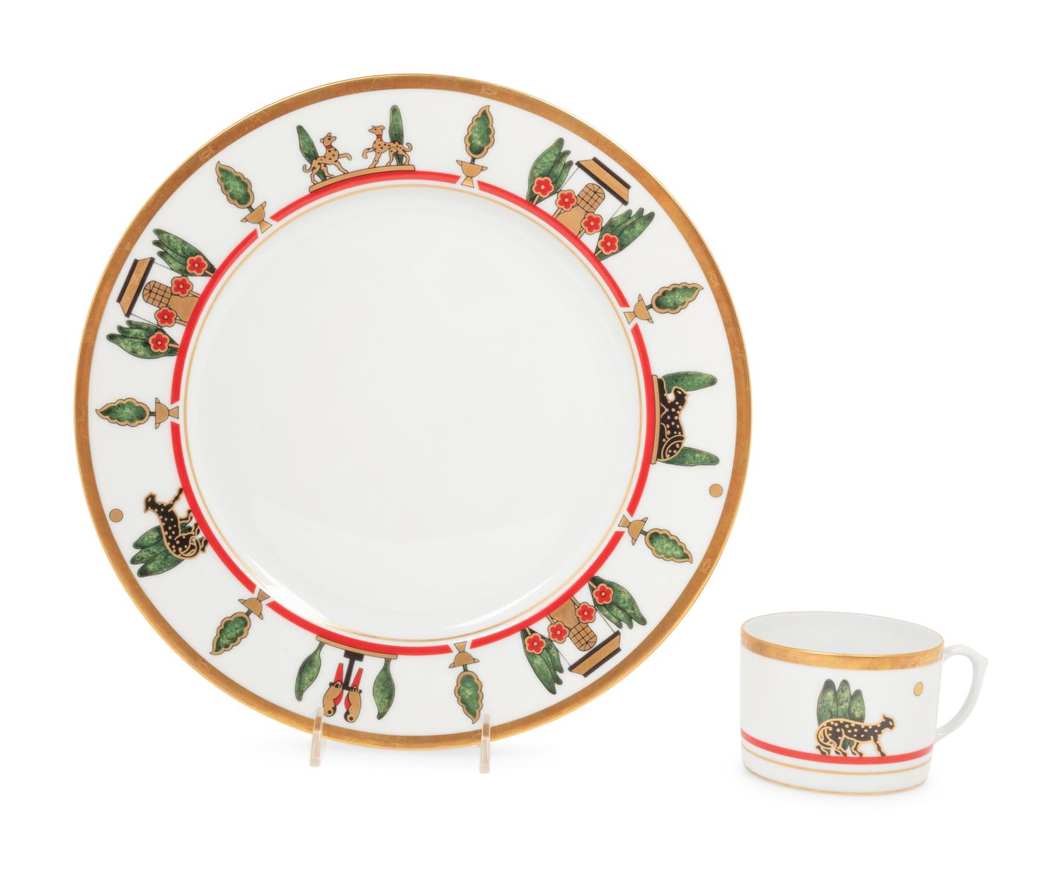 A Cartier La Maison de Louis Porcelain Dinner Service for Twelve