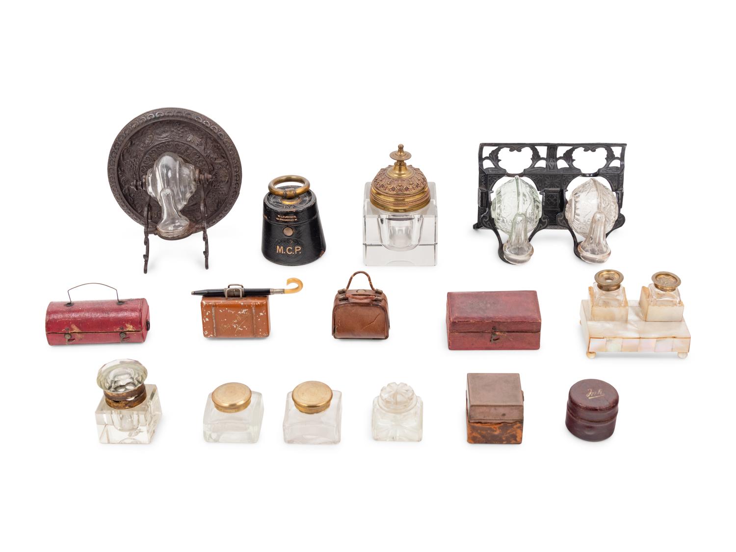A Group of English Inkwells and Miniature Stationery Cases