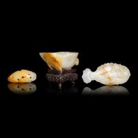 Two Chinese Jade Ornaments and A Jadeite 'Lotus Leaf' Brush Washer, Qing Dynasty 清 黃翡荷葉洗及白玉灑金把件兩枚