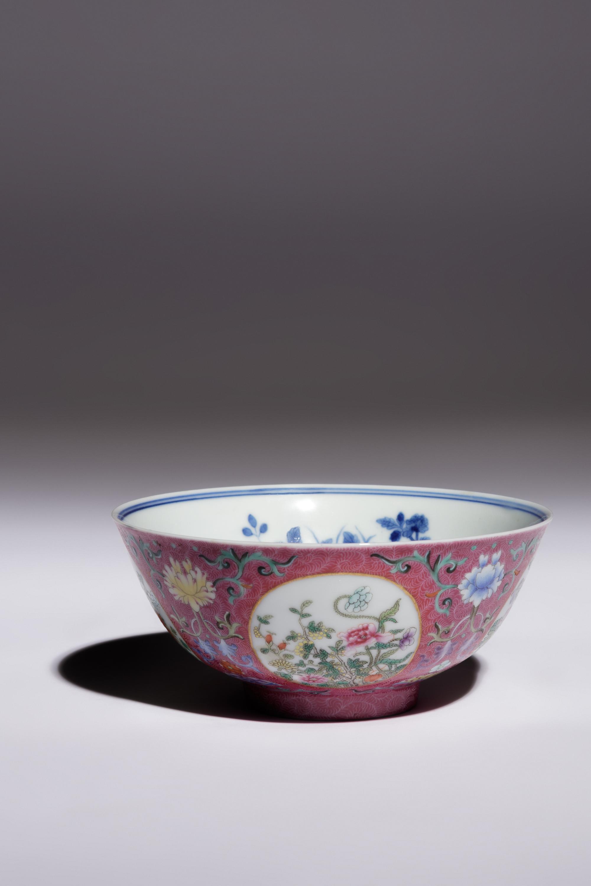 A Ruby Sgraffito Ground Famille Rose and Underglaze Blue Porcelain Bowl