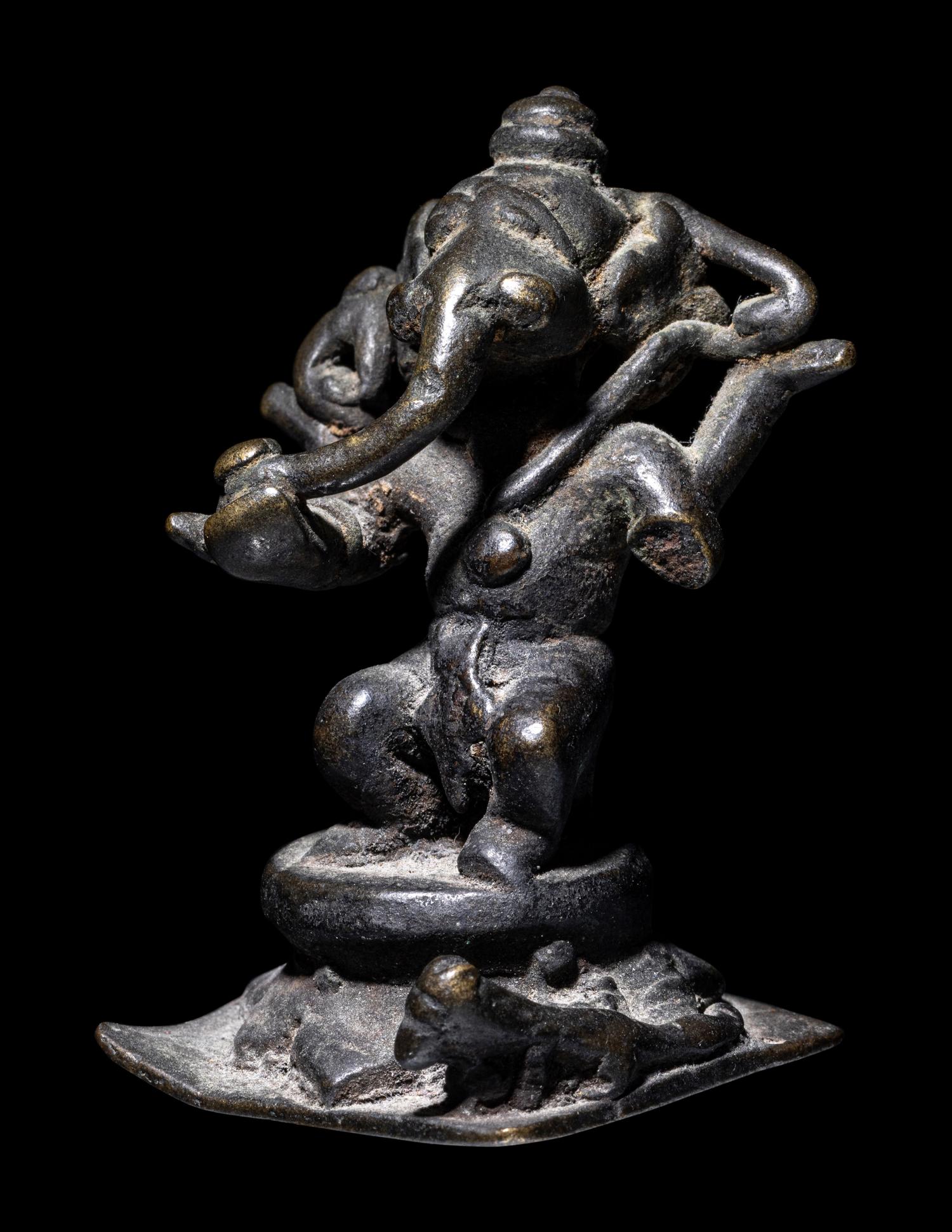 A Small Indian Bronze Figure of Ganesha