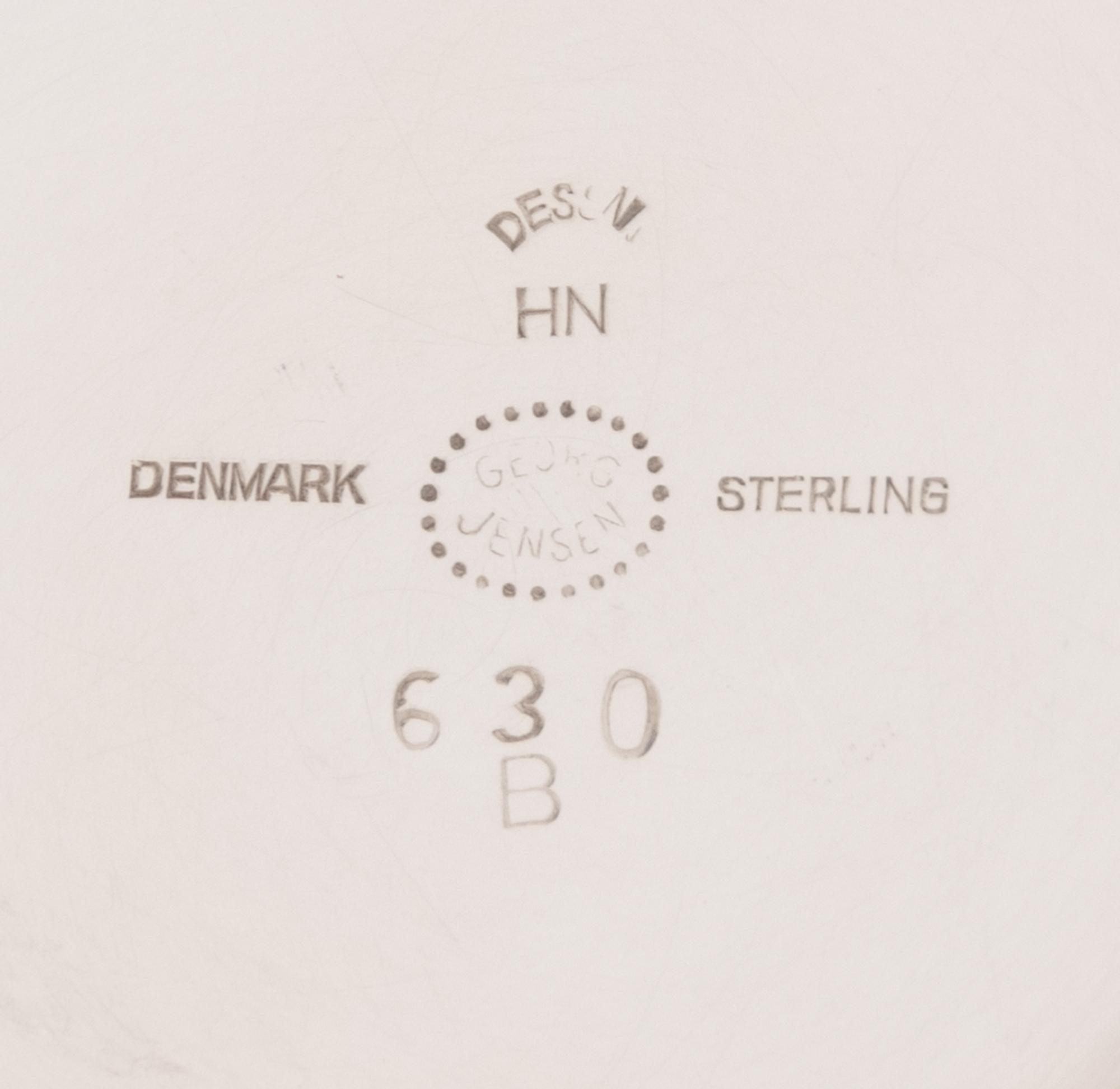 A Pair of Georg Jensen Silver Two-Light Candelabra