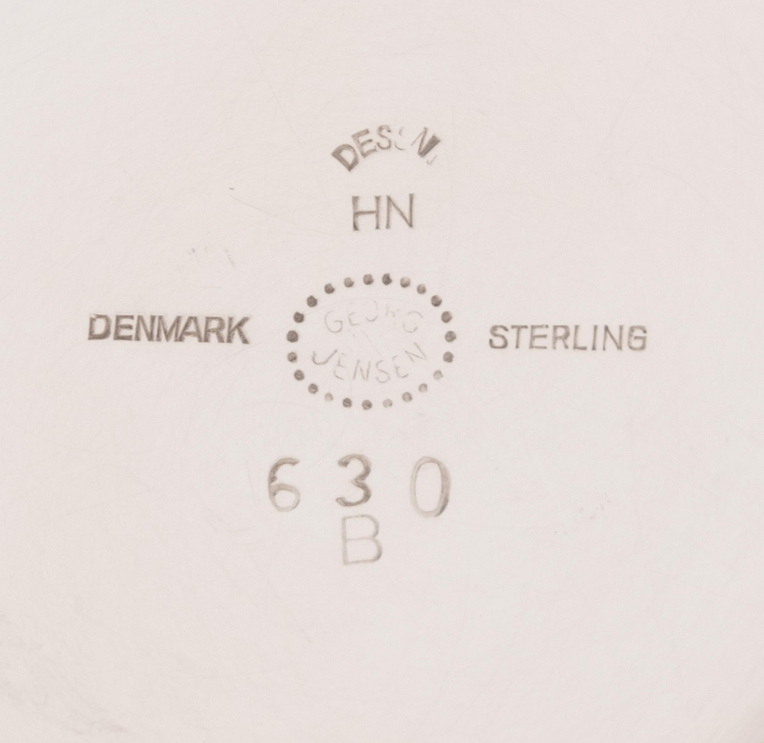 A Pair of Georg Jensen Silver Two-Light Candelabra