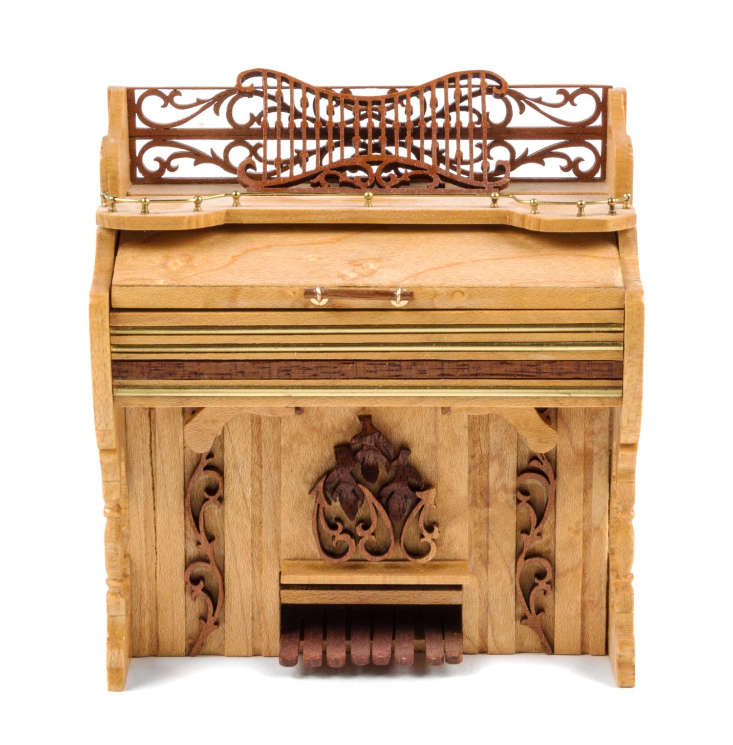 An Upright Piano Height 3 3/4 x width 3 1/2 x depth 1 3/4 inches. — Danny Rodriguez