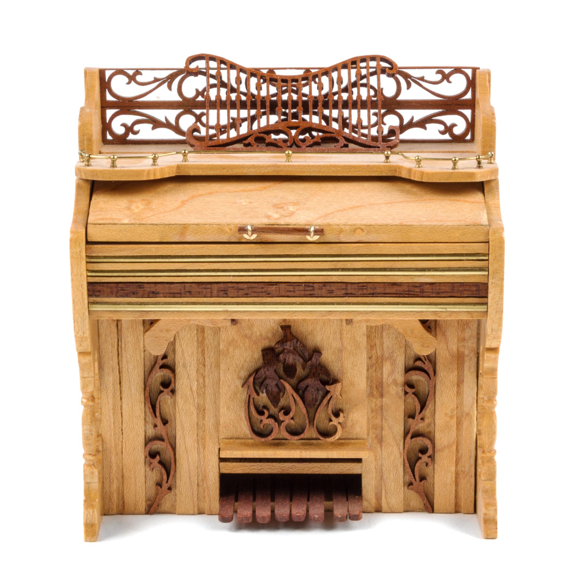 An Upright Piano Height 3 3/4 x width 3 1/2 x depth 1 3/4 inches. — Danny Rodriguez