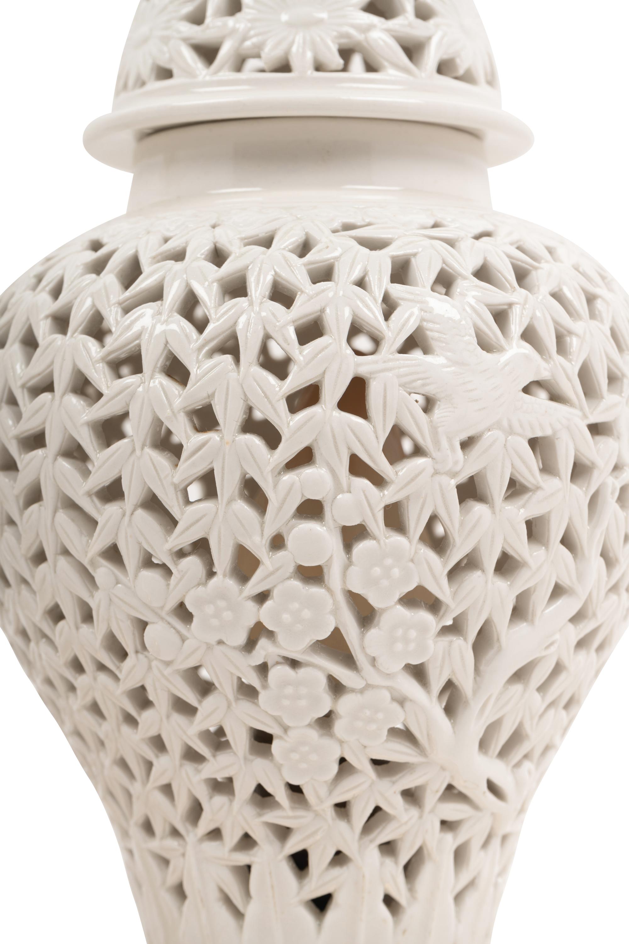 A Pair of White-Glazed Pierced Porcelain Jars Mounted as Lamps