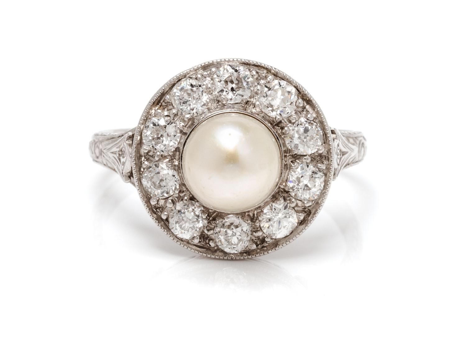 An Edwardian Platinum, Pearl and Diamond Ring, 3.20 dwts.