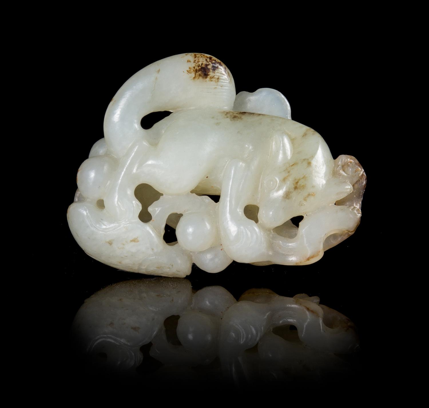 A White Jade Toggle Length 2 1/4 inches.