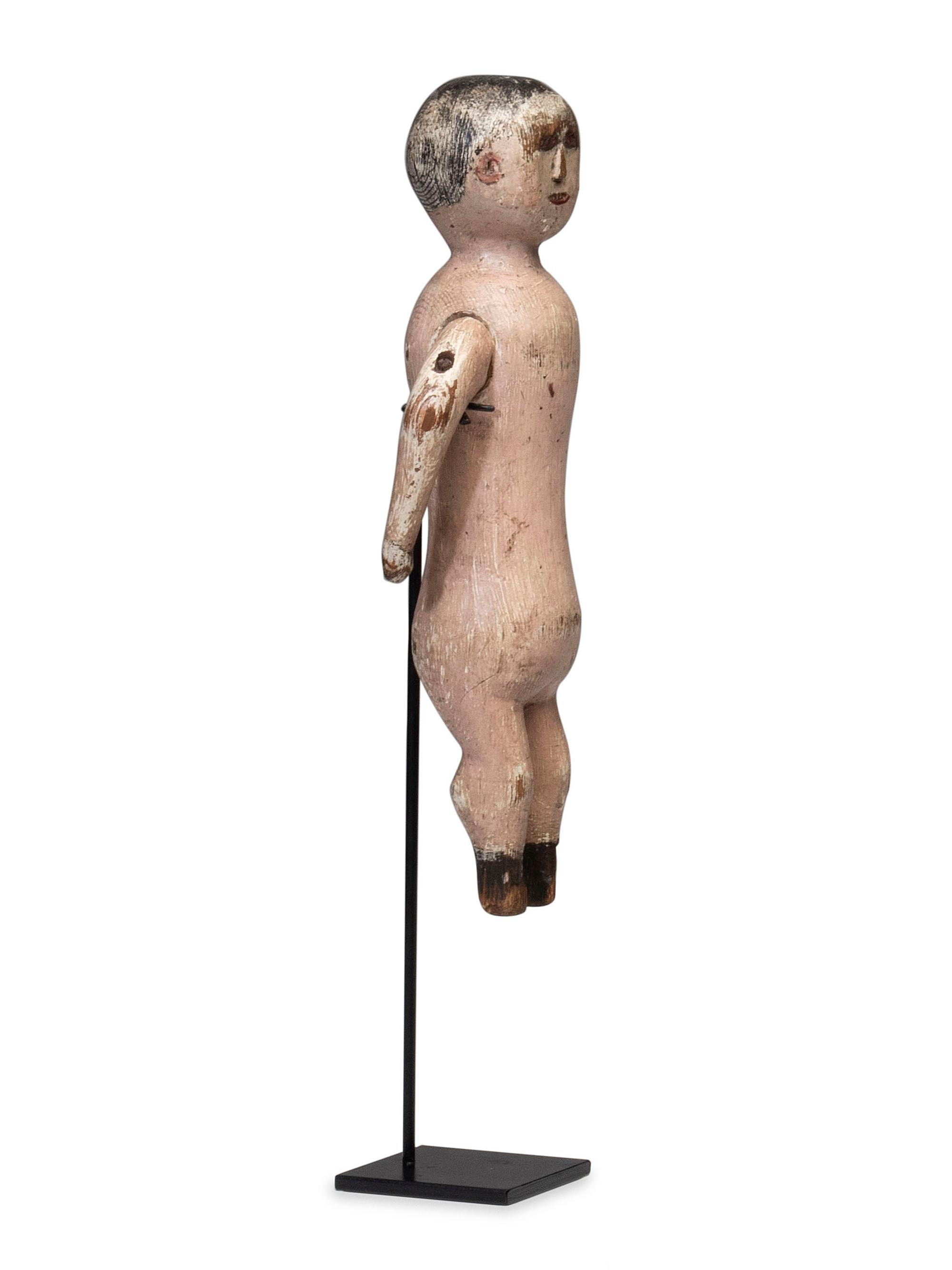 A Carved and Painted Wood Whirligig