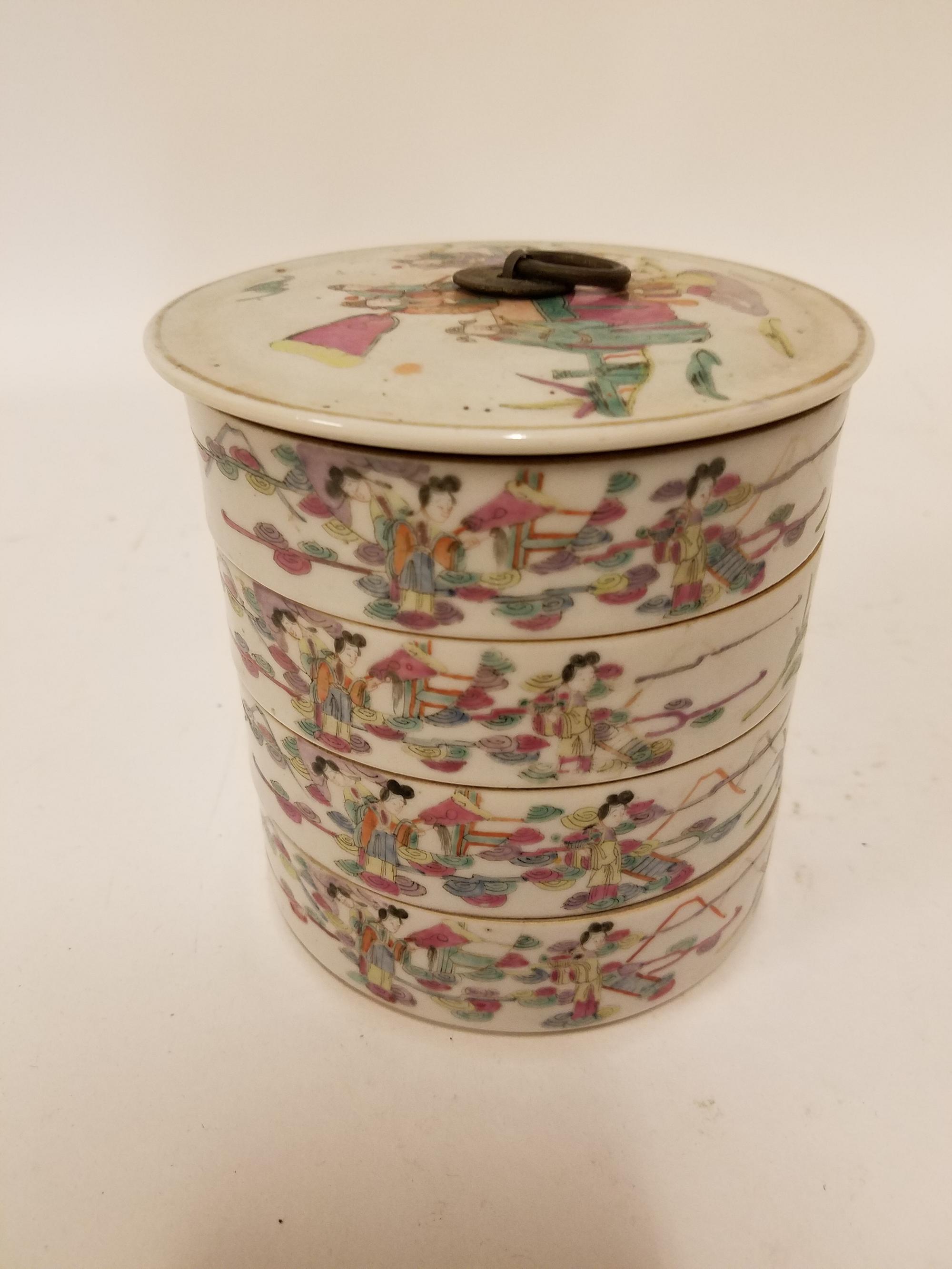 A Famille Rose Porcelain Stack Box. Height overall 5 1/8 inches.