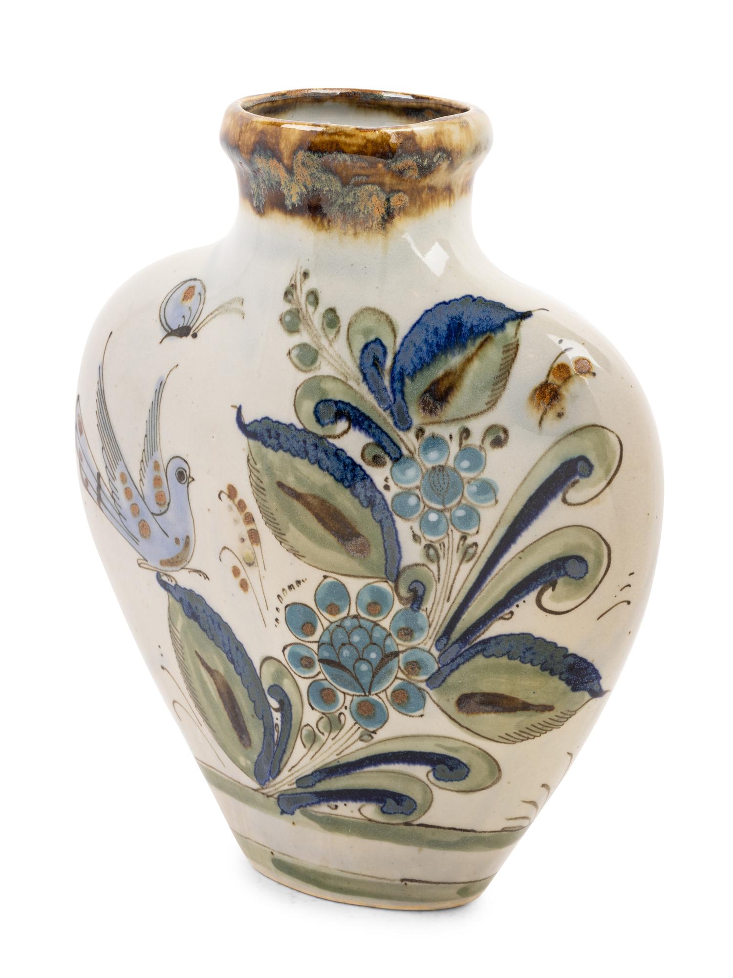 A Mexican Glazed Terra Cotta Vase