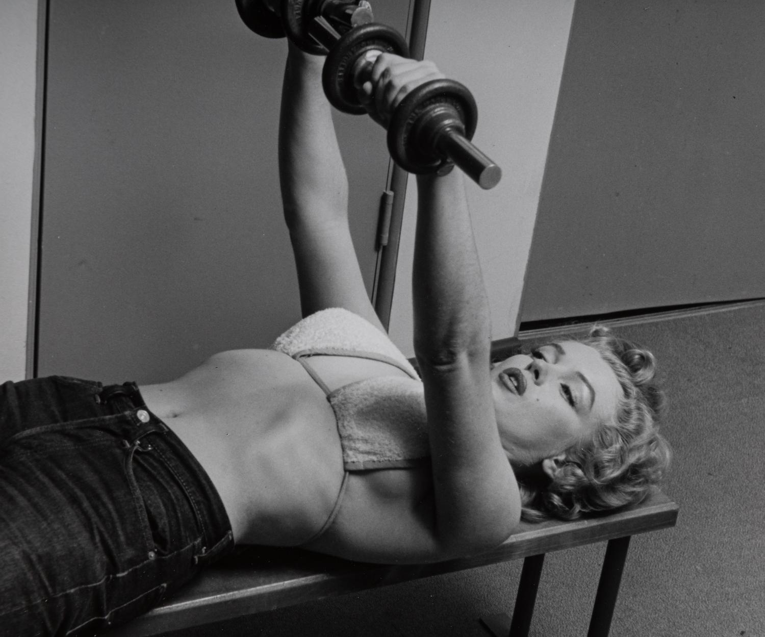 Philippe Halsman (1906-1979) Marilyn Monroe Lifting Weights, 1952
